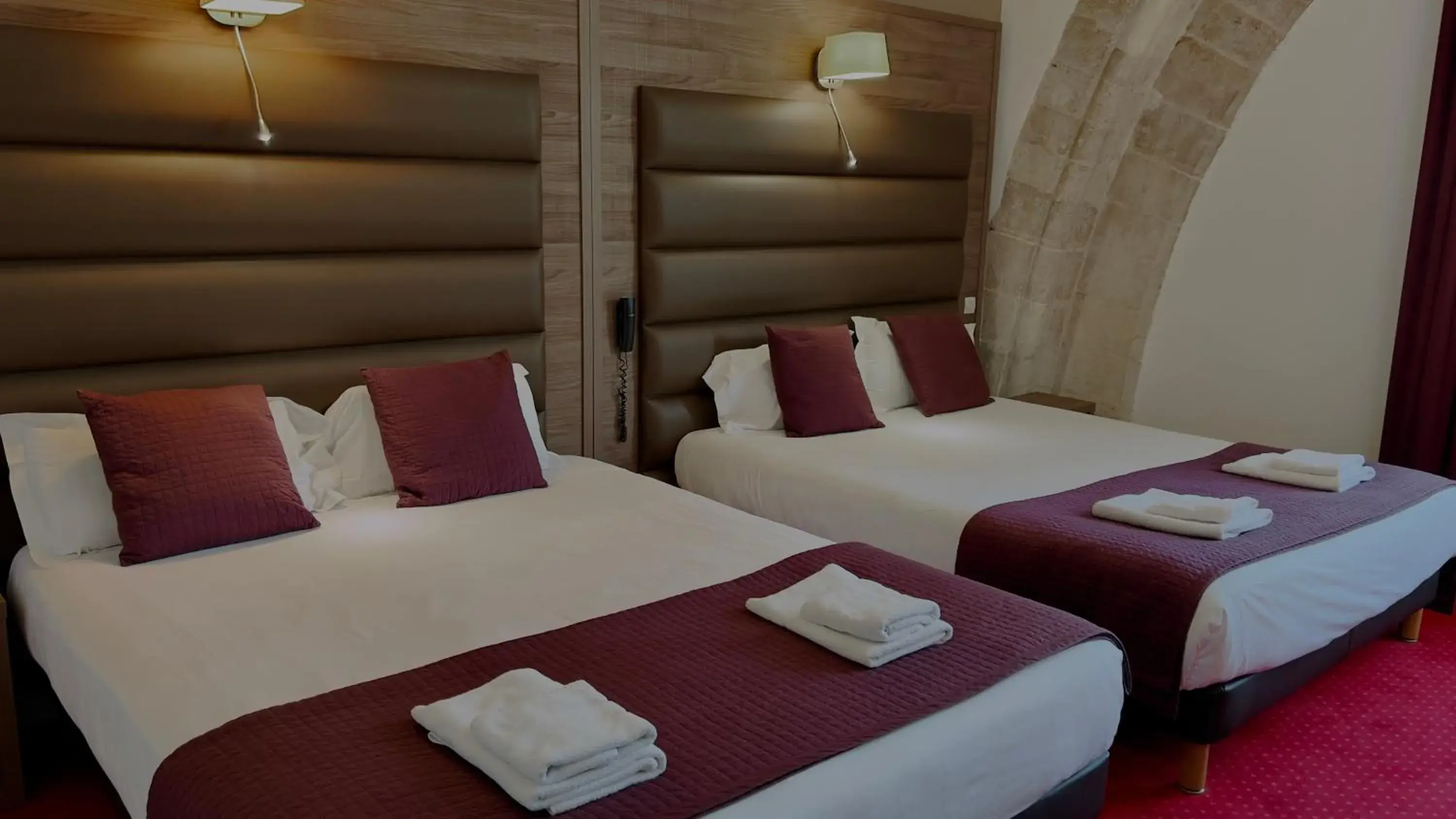 Executive Quadruple Room in L'Hostellerie du Château de Bricquebec Executive Quadruple Room in L'Hostellerie du Château de Bricquebec