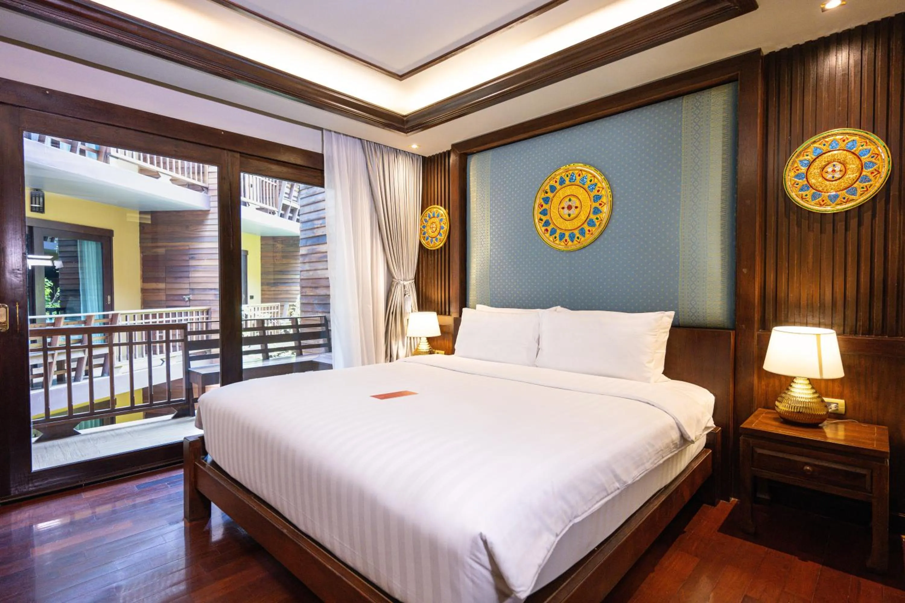 Bed in At Gate Thaphae Hotel