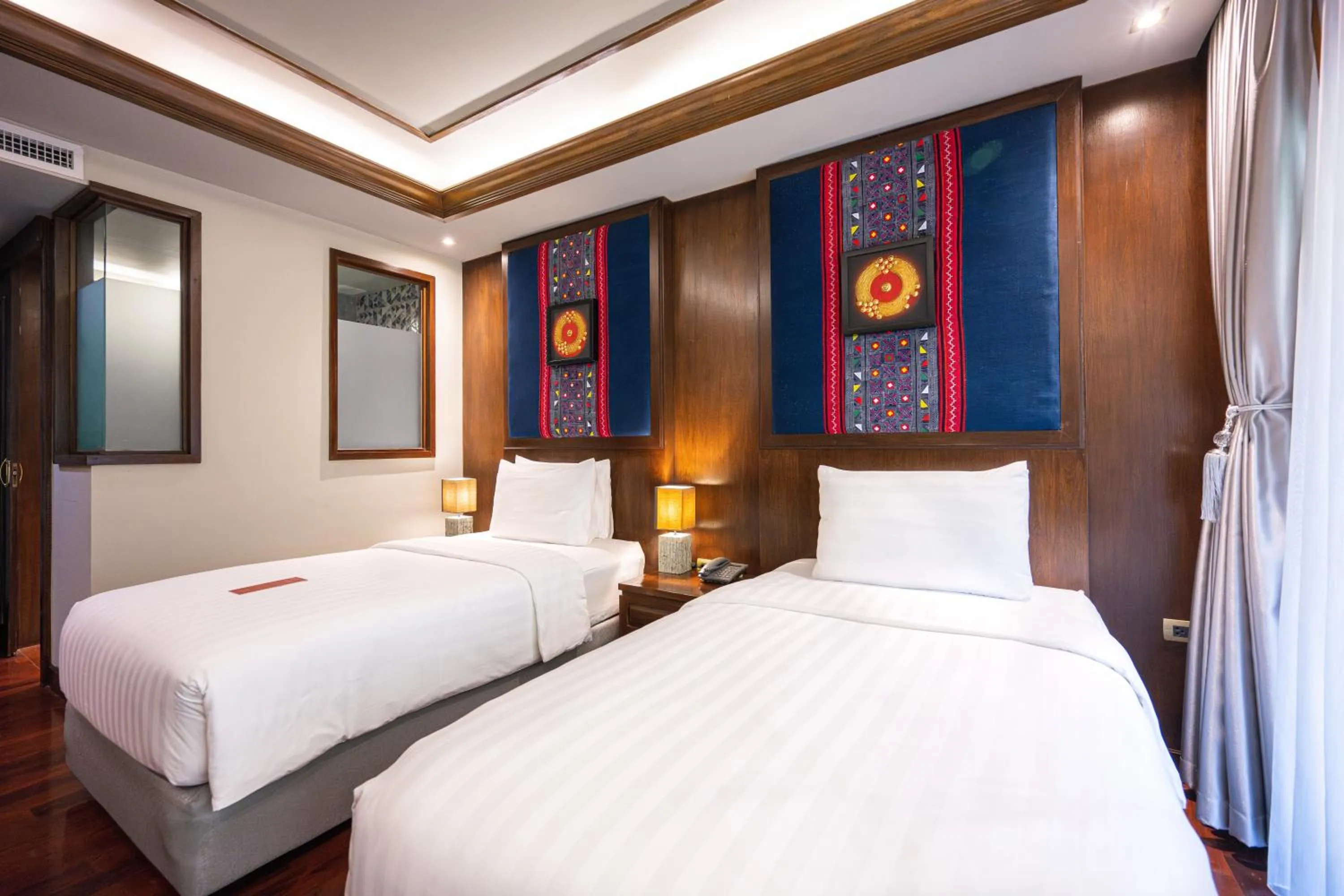 Bed in At Gate Thaphae Hotel