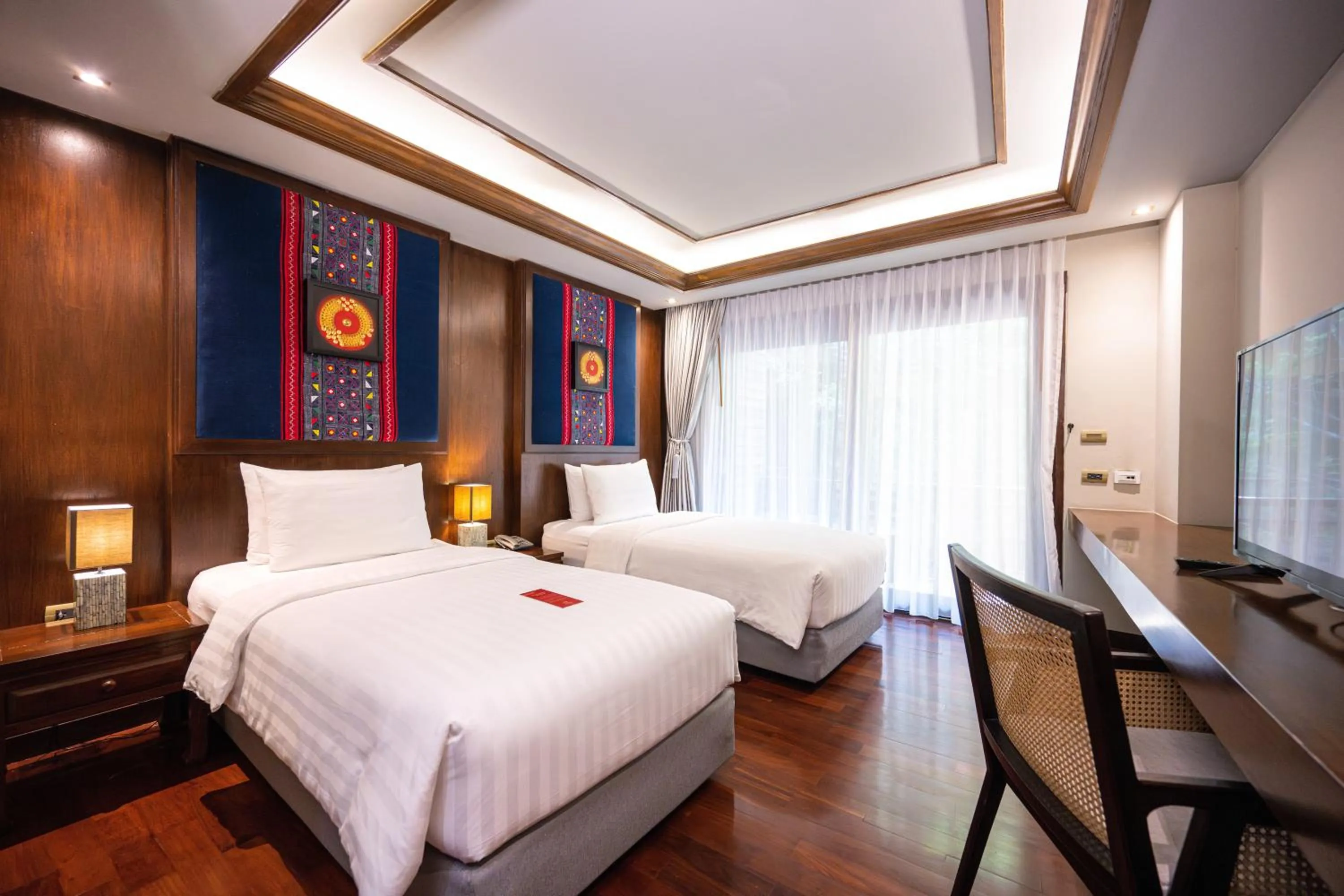 Bed in At Gate Thaphae Hotel