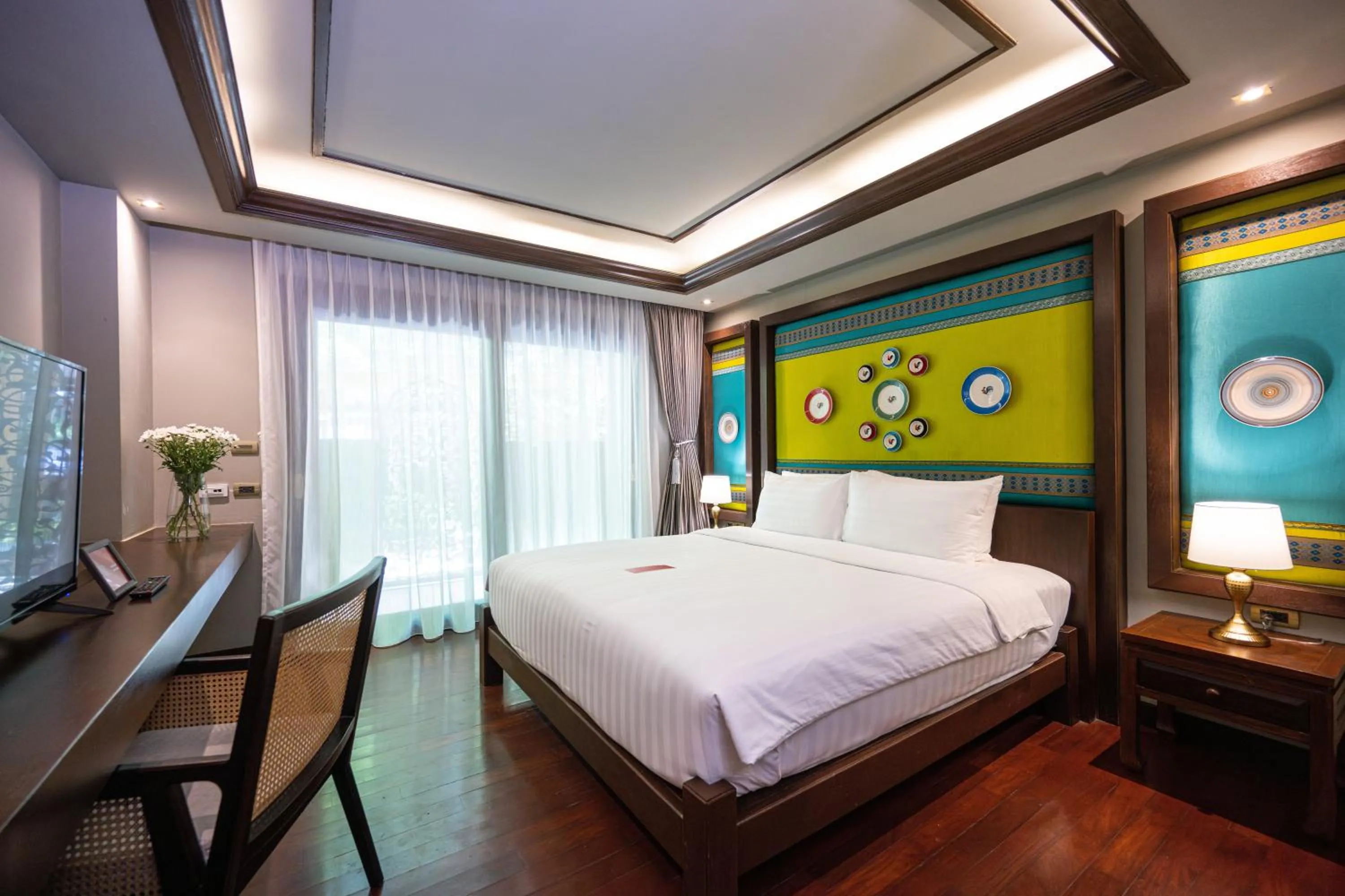 Bed in At Gate Thaphae Hotel