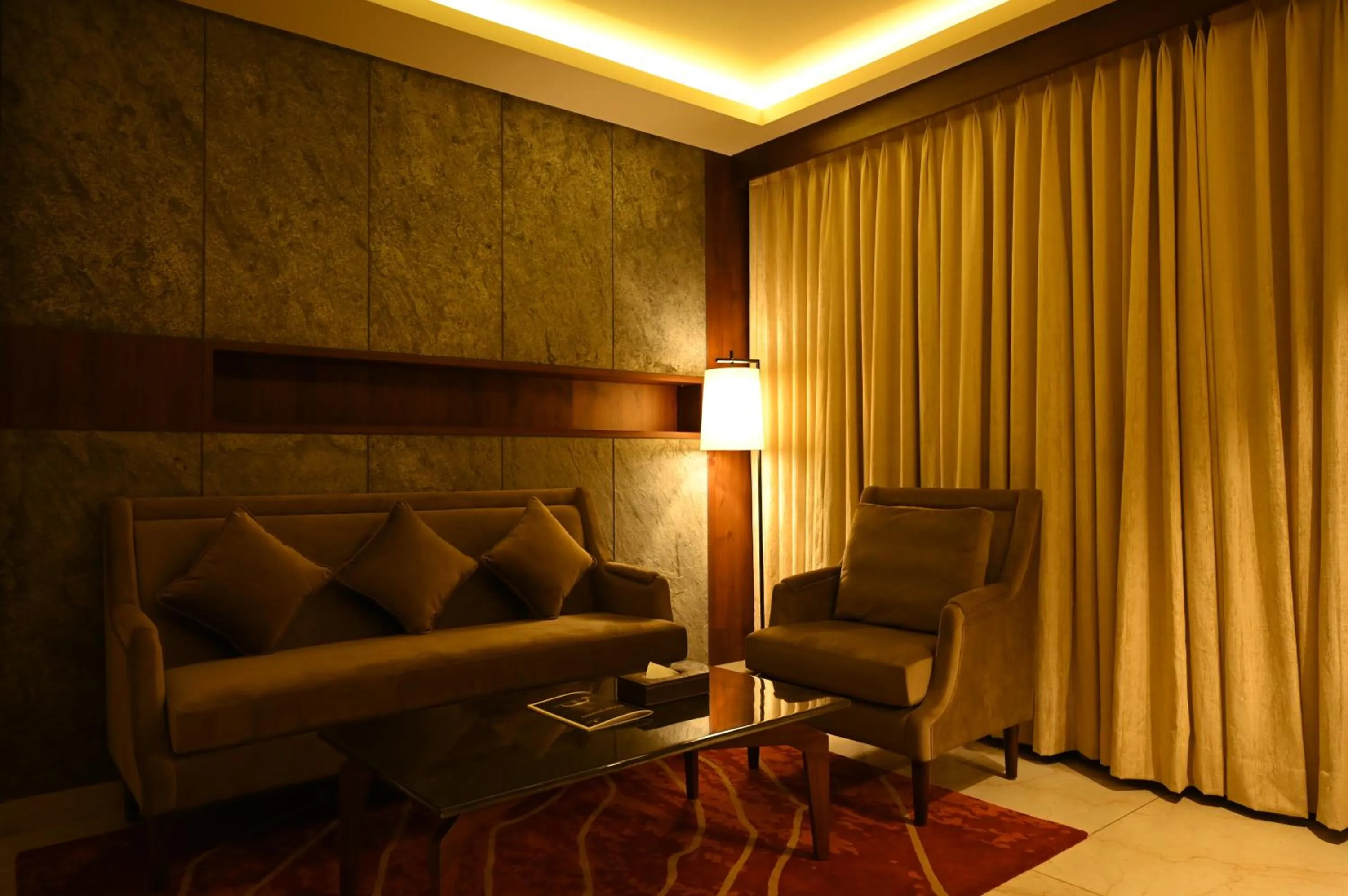 Seating area in HOTEL PAHADI