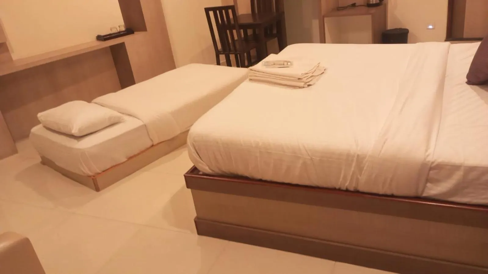 Bed in Hotel Ramtel inn