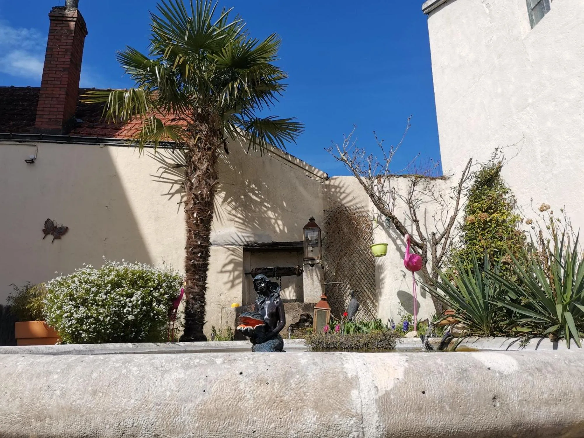 Patio in Logis Hotel Le Cerf