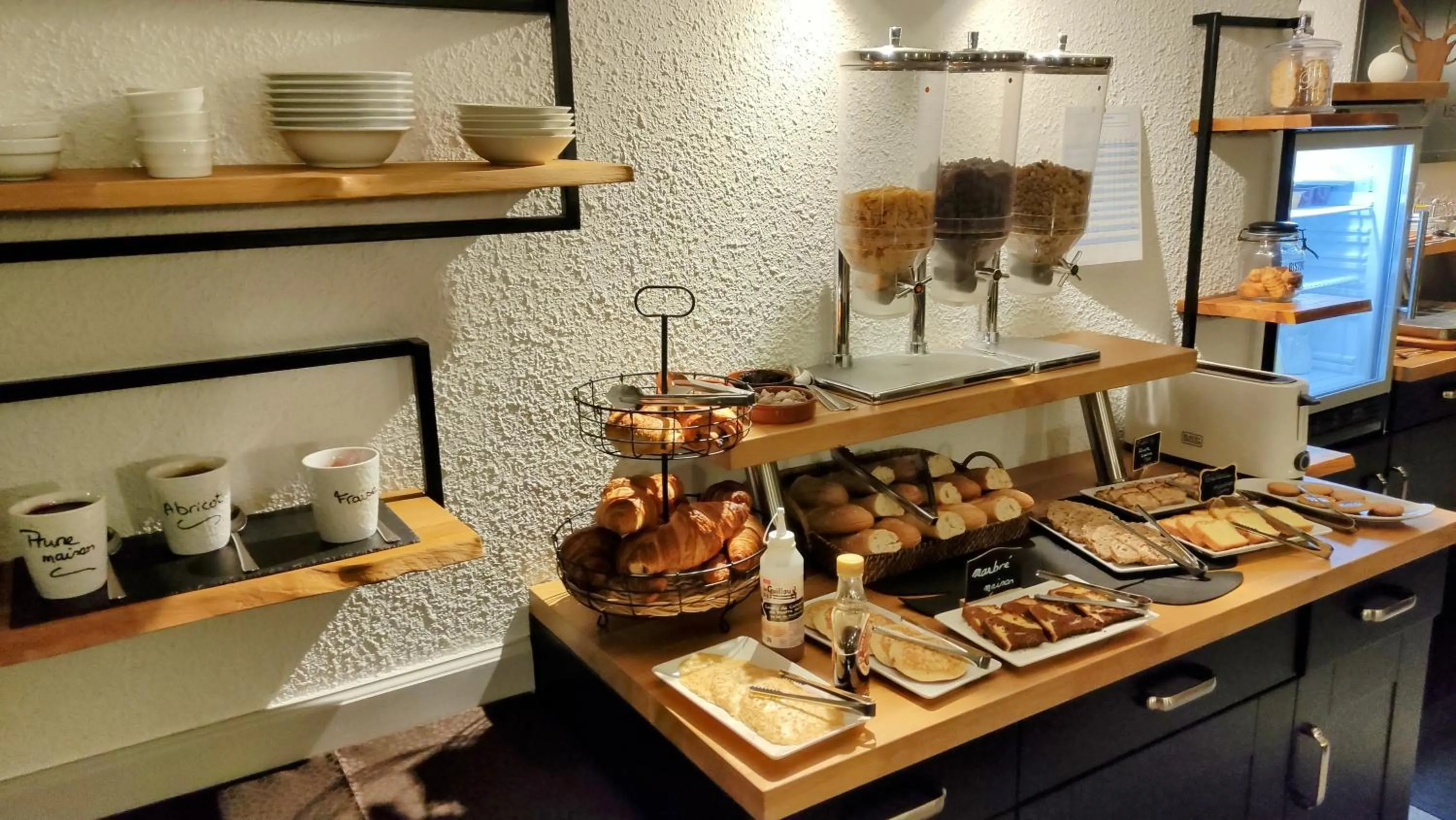 Buffet breakfast in Logis Hotel Le Cerf