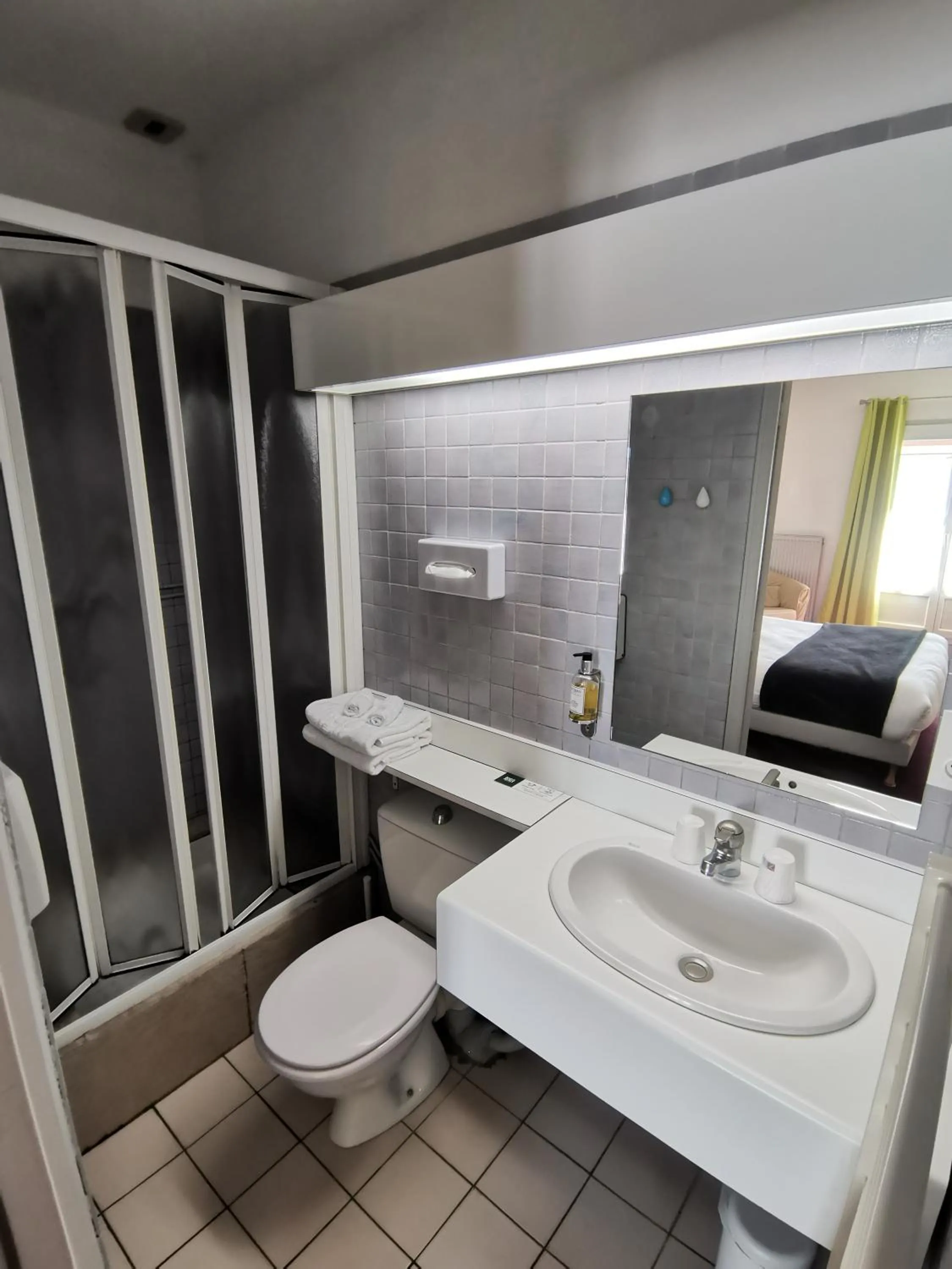 Inner courtyard view in Logis Hotel Le Cerf