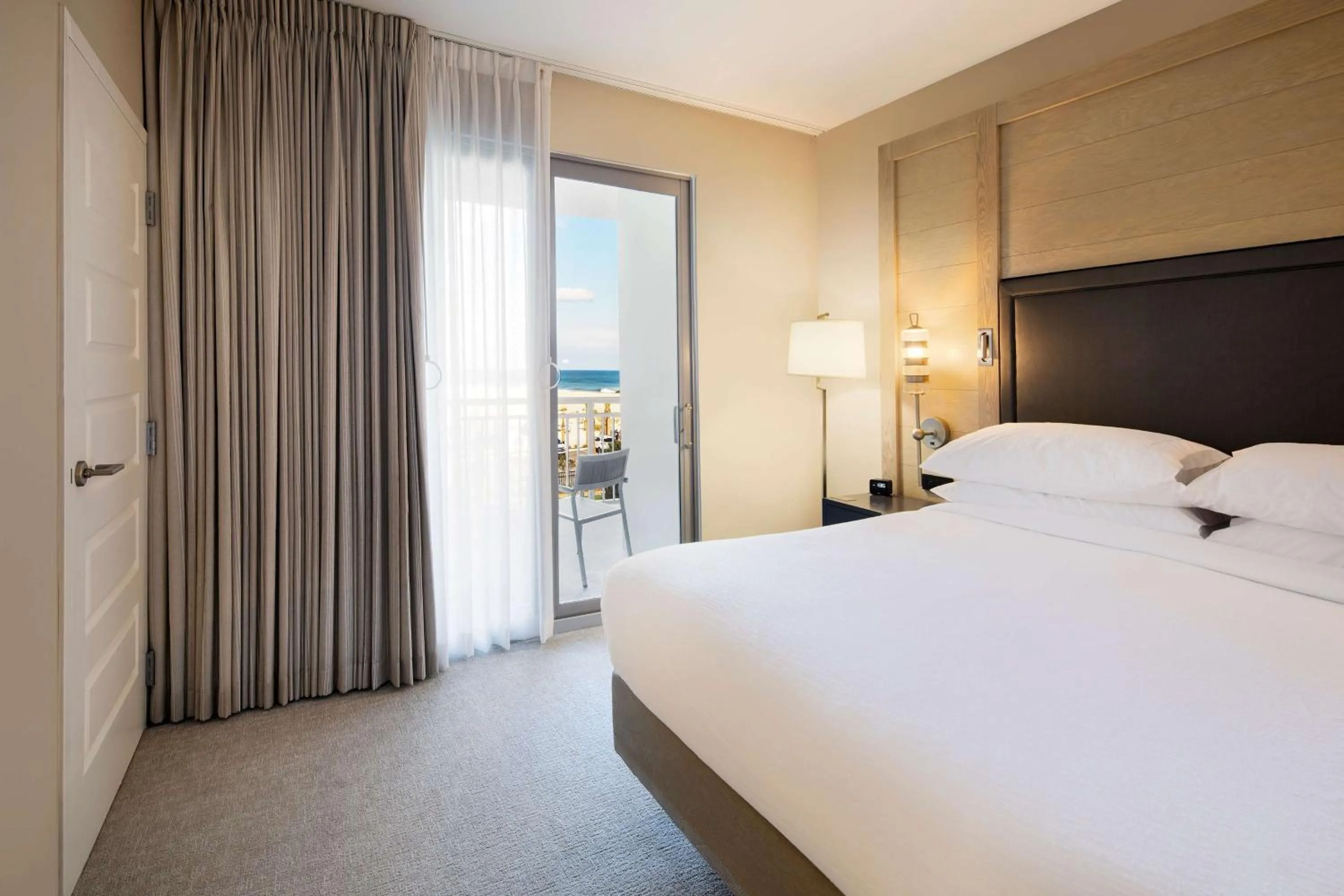 Bed in Embassy Suites St Augustine Beach Oceanfront Resort