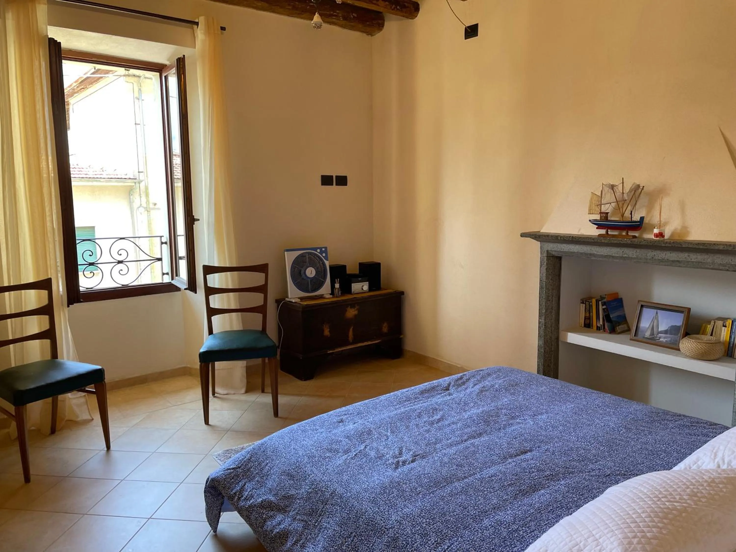 Photo of the whole room, Bed in La Casa Sul Sasso In town serviced accommodations