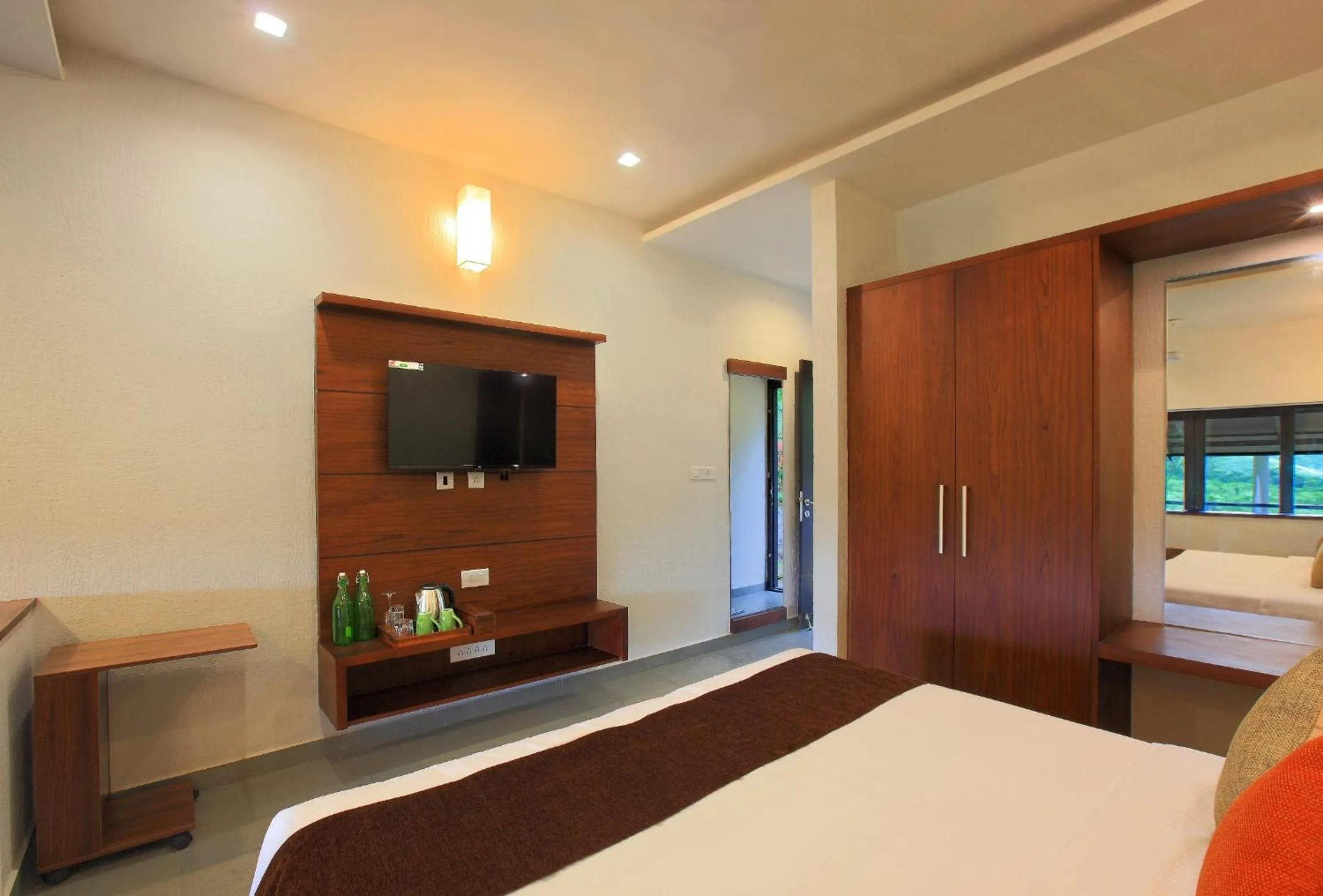 Bed in Tea Terrain Resorts & Spa