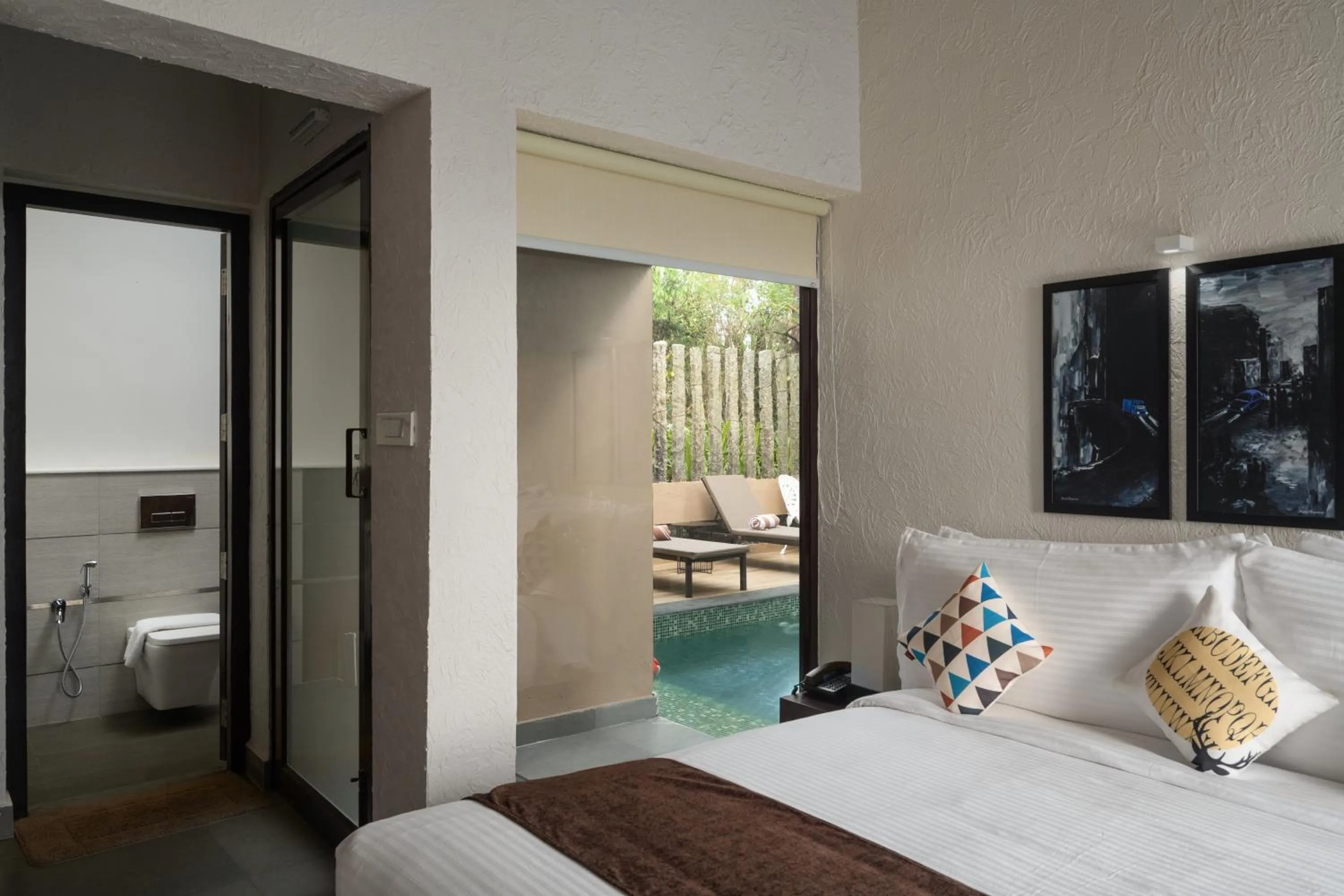 Bed in Tea Terrain Resorts & Spa