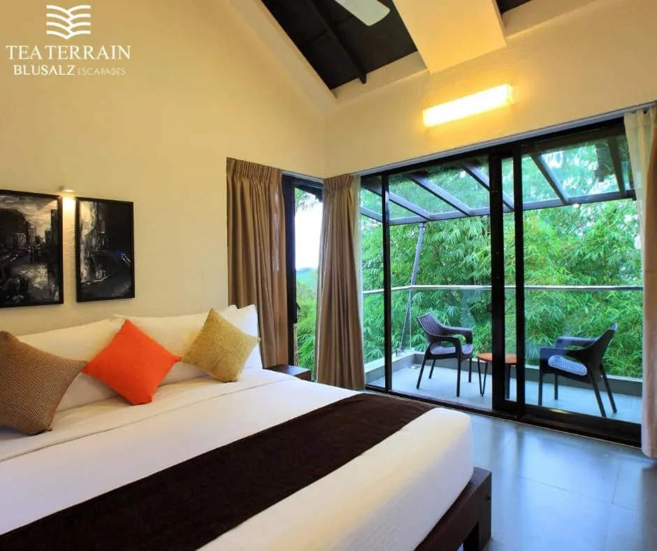 Bed in Tea Terrain Resorts & Spa