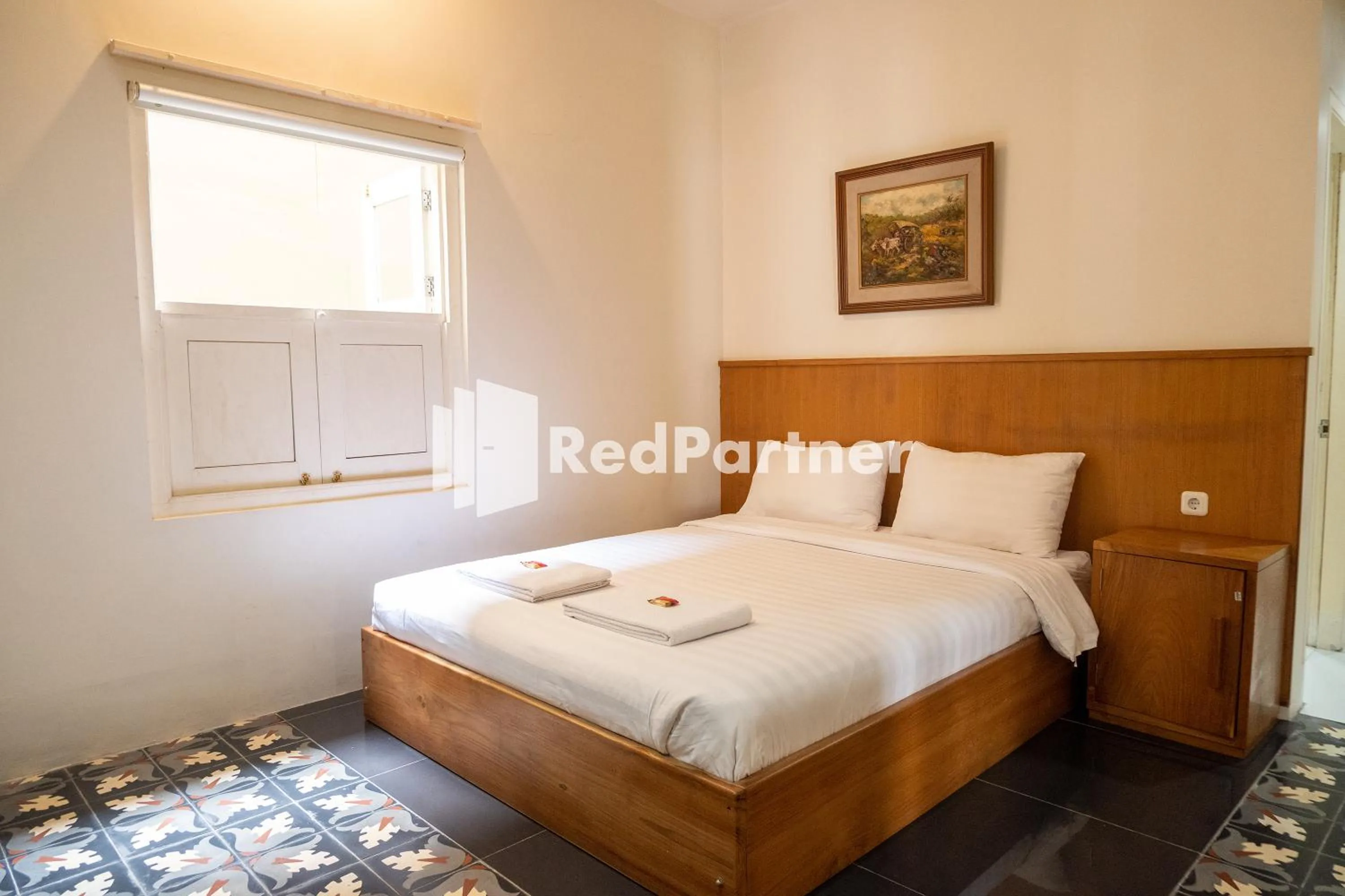 Bedroom, Bed in Villa Dora Jogja near Malioboro Area Mitra RedDoorz