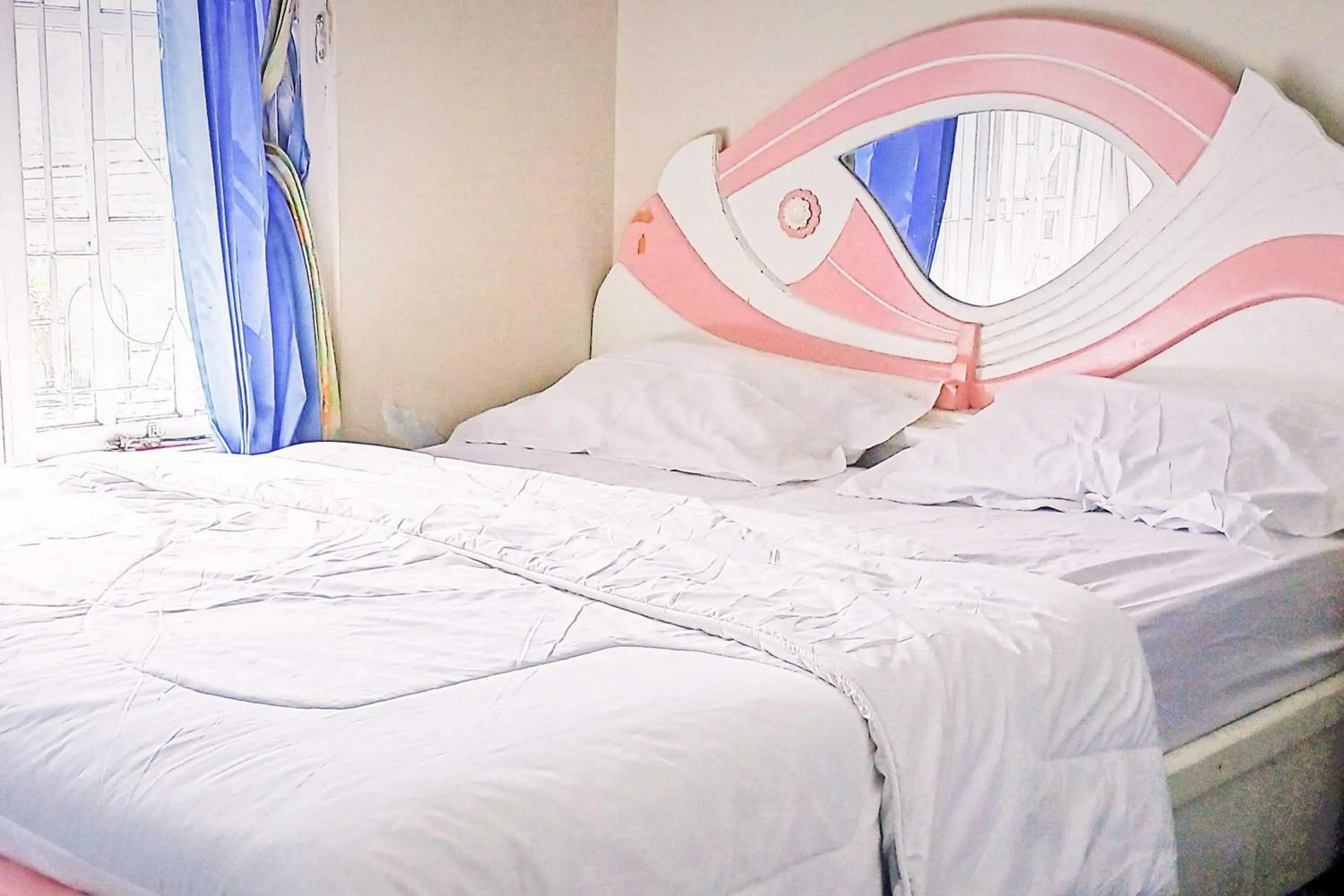 Bed in Arjuna 2 Homestay Syariah Dieng