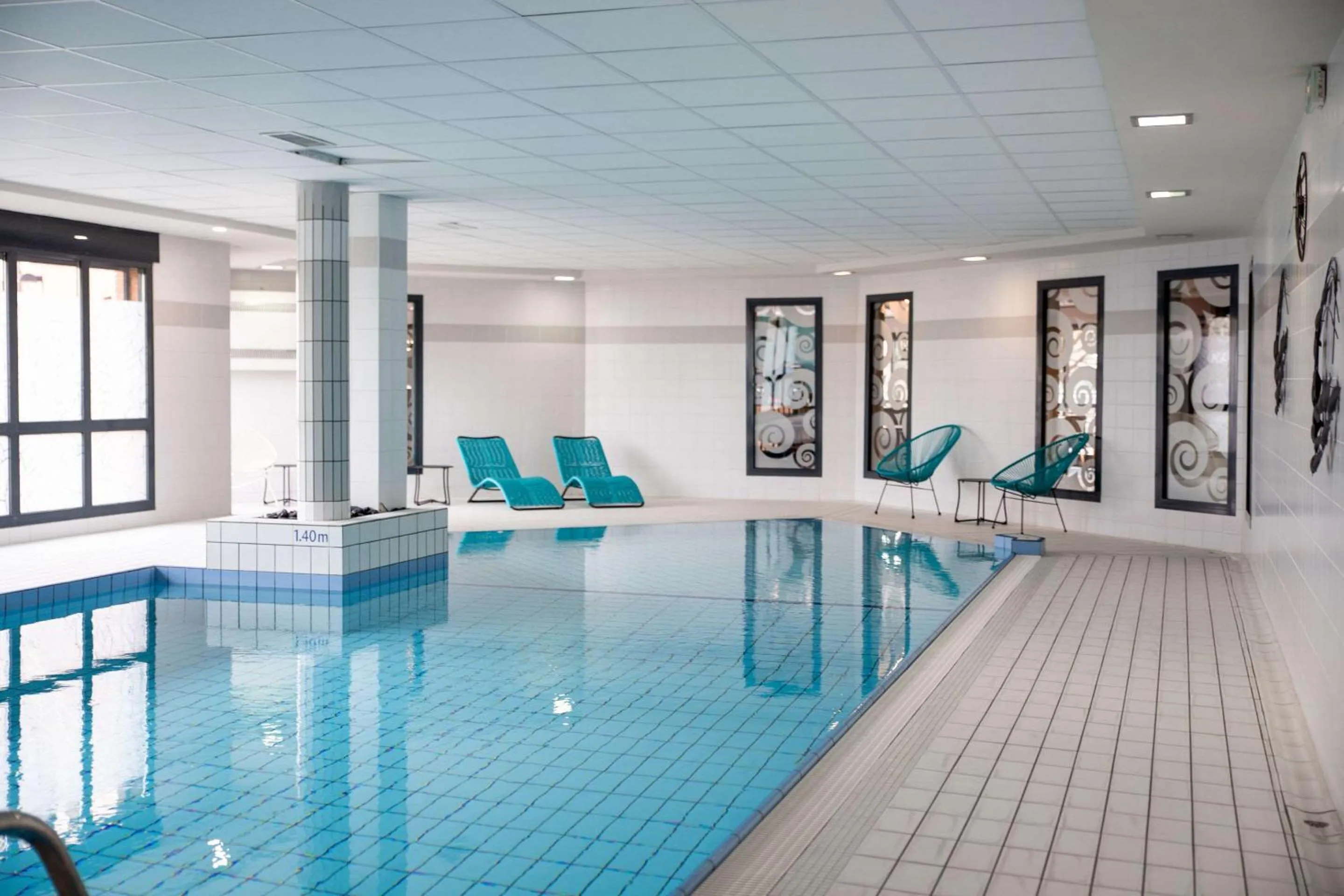 Swimming pool in Clarion Aparthotel Toulouse Blagnac Airport