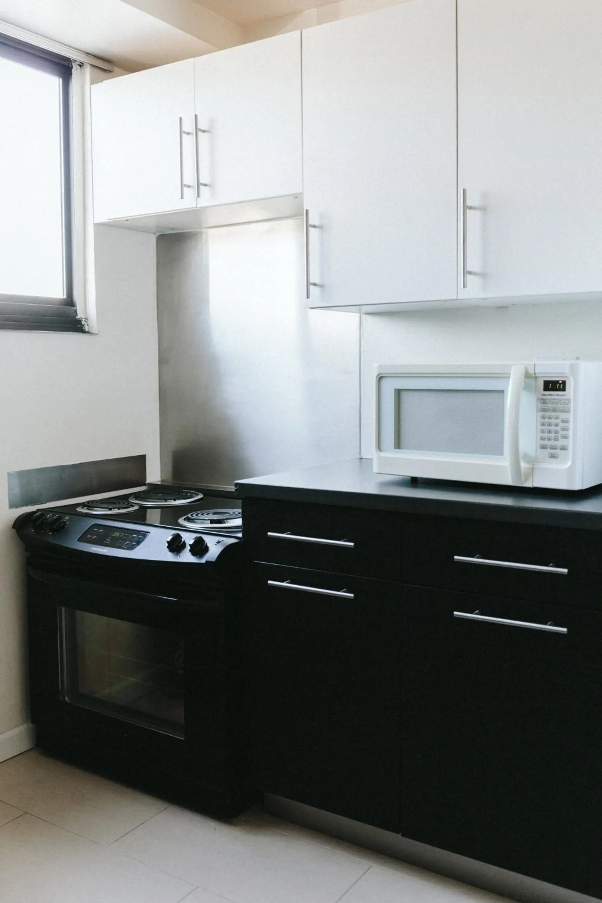 Kitchen or kitchenette in Stamford Suites