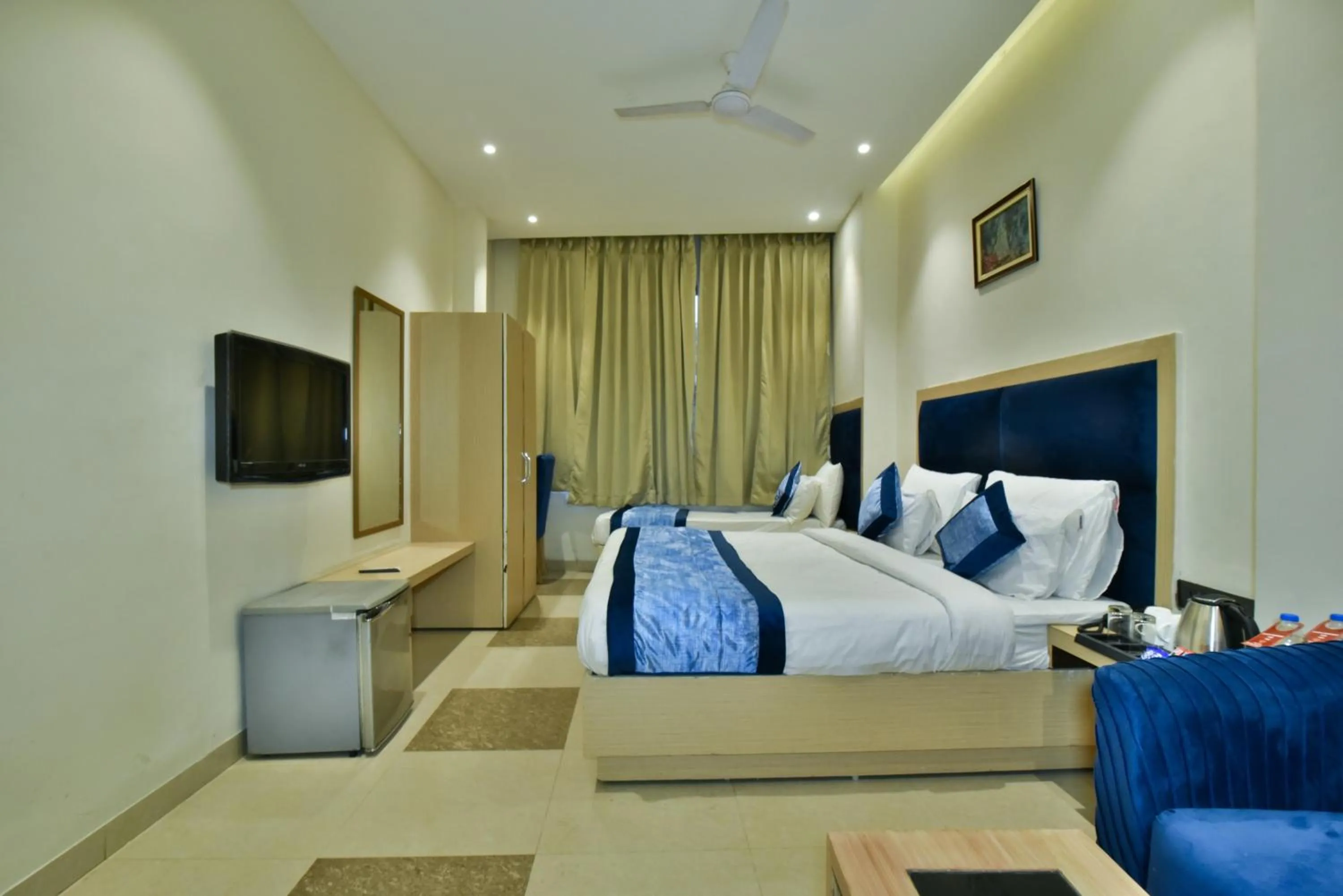 Bed in Hotel Puri Palace