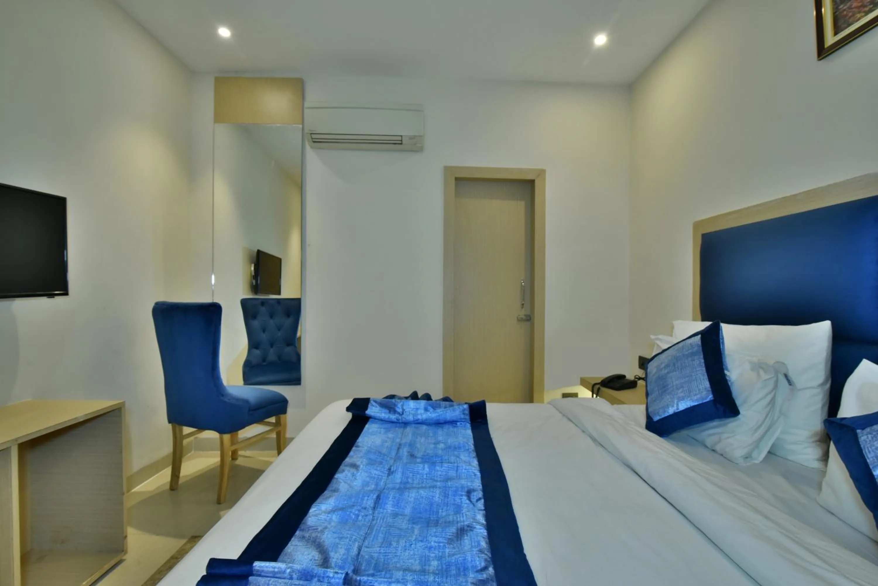 Bed in Hotel Puri Palace