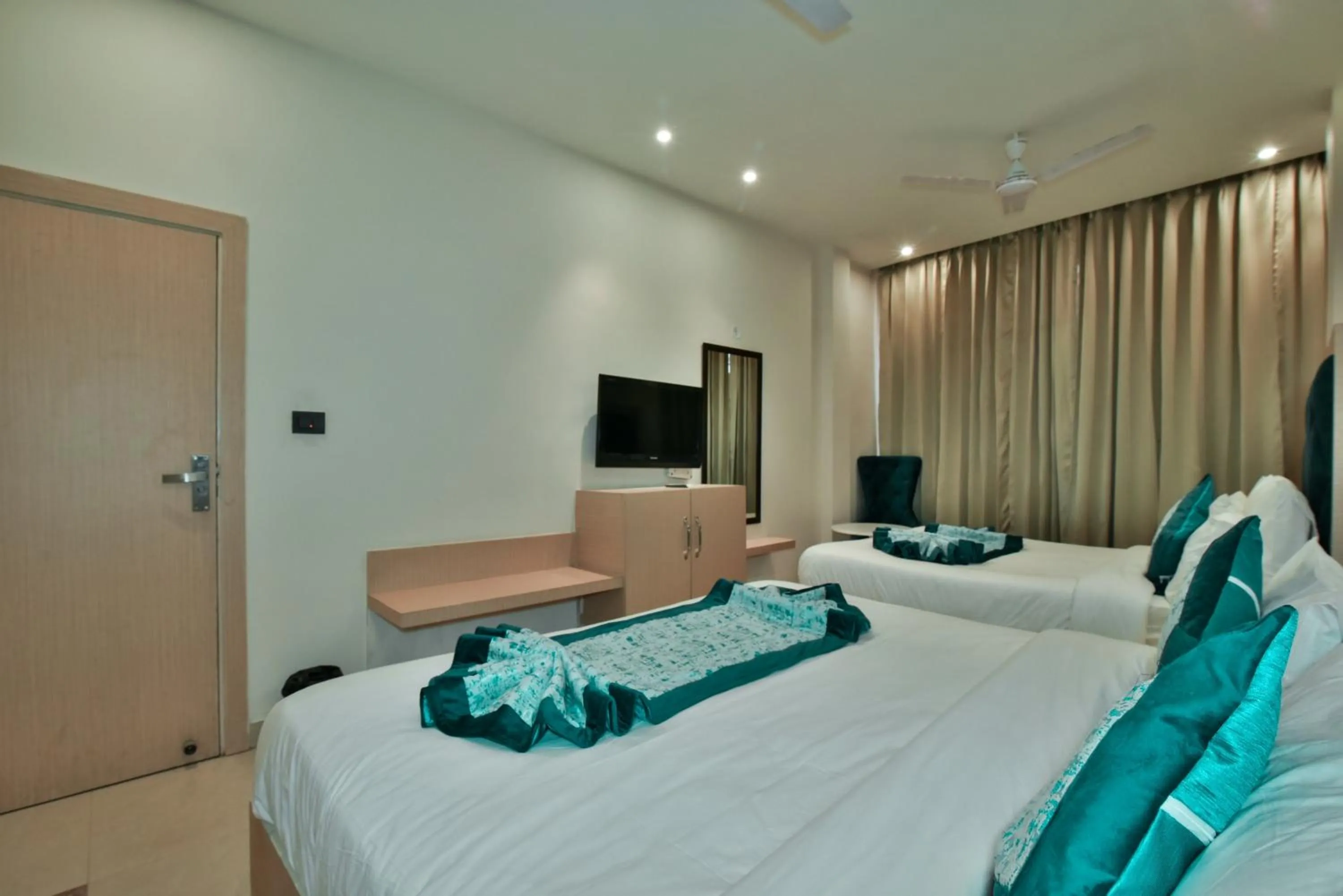 Bed in Hotel Puri Palace