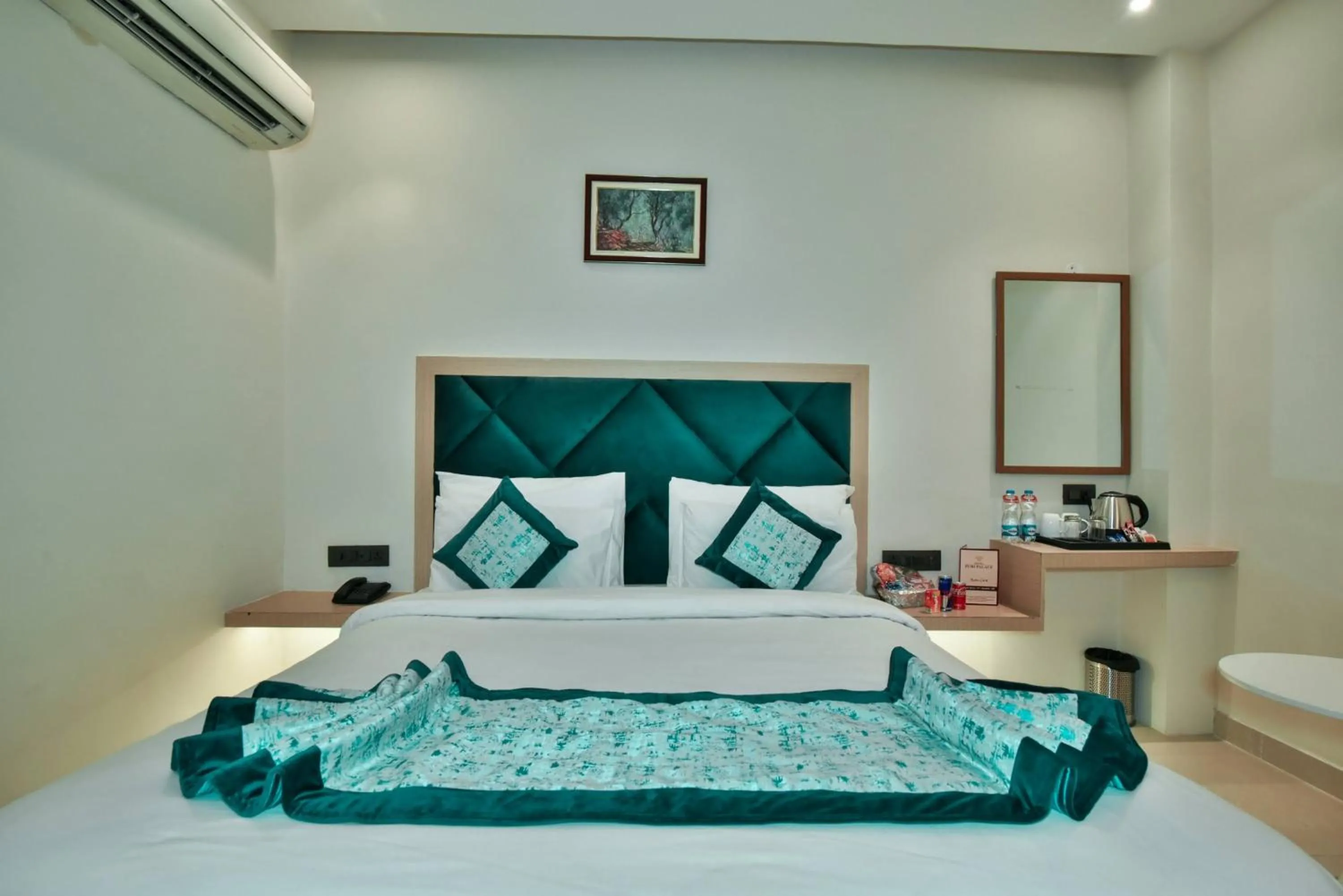 Bed in Hotel Puri Palace