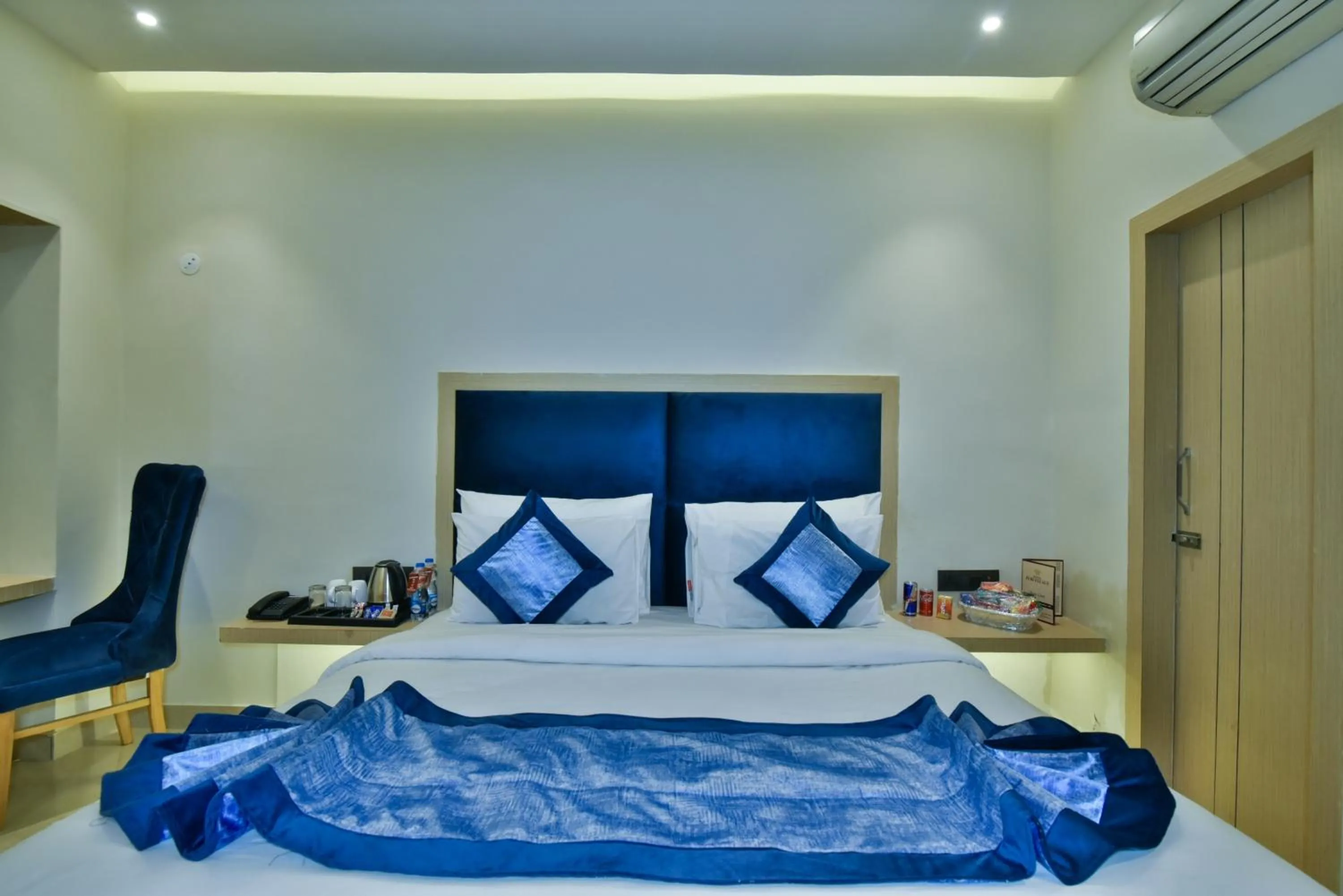 Bed in Hotel Puri Palace