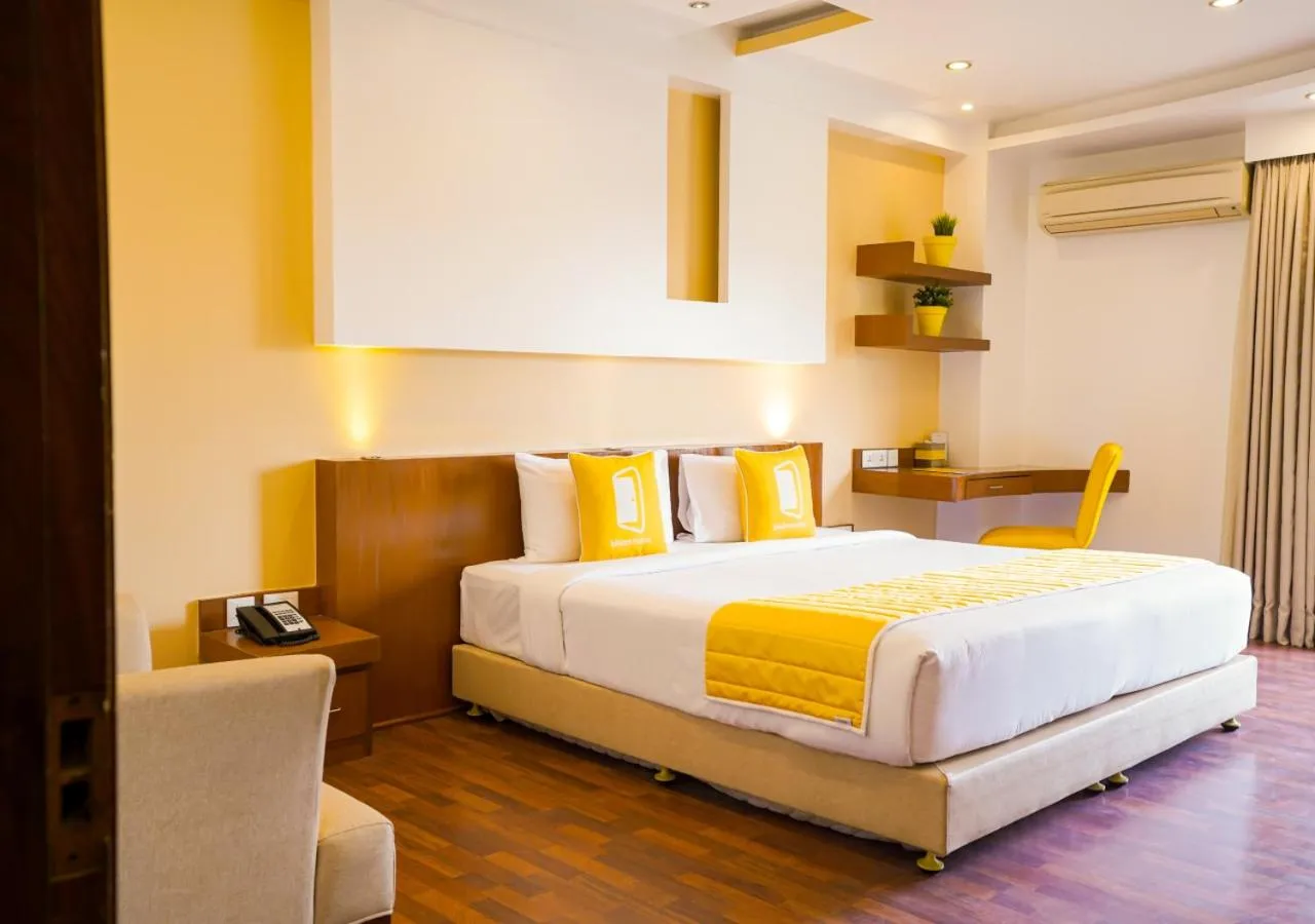 Photo of the whole room, Bed in BloomSuites I Electronics City