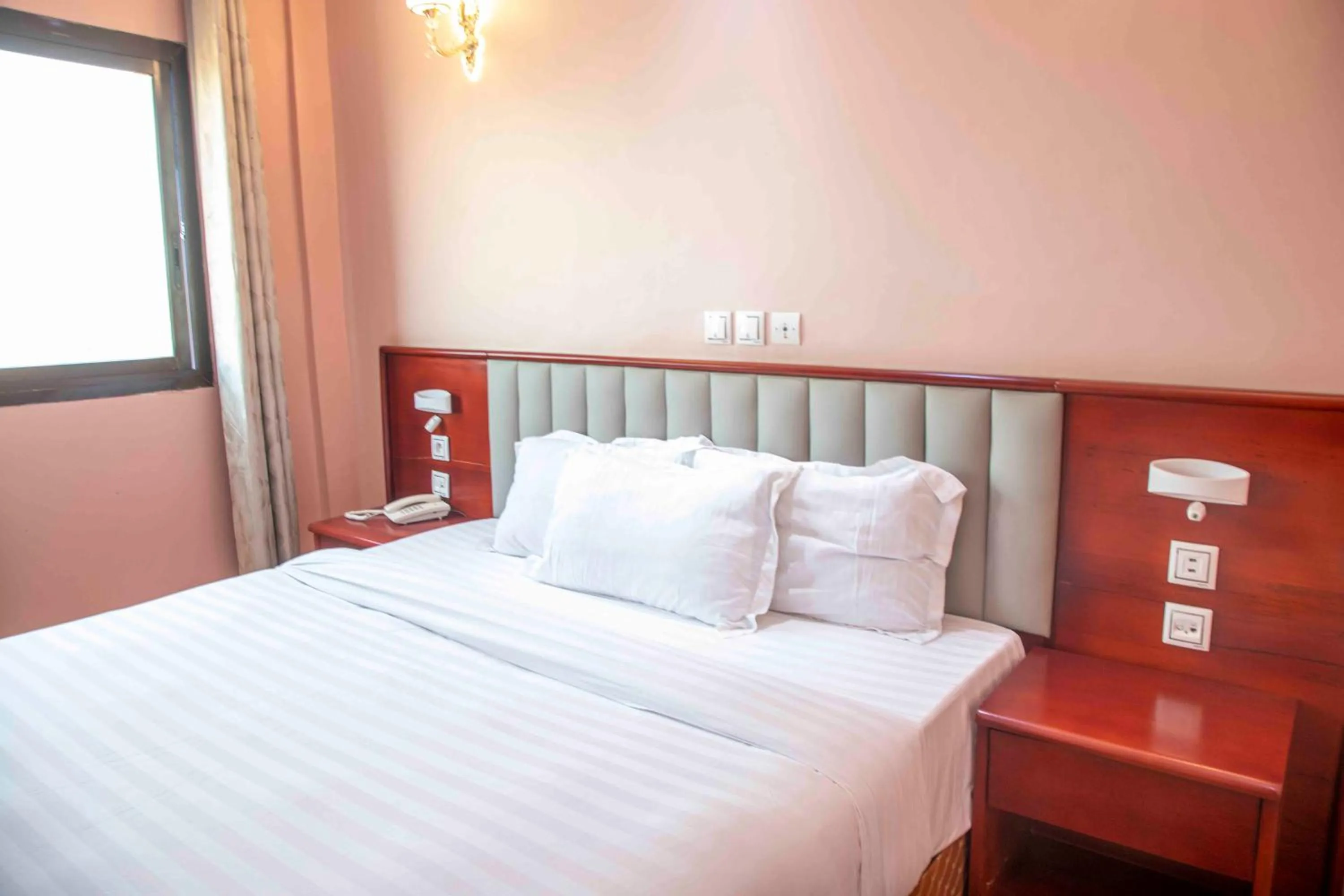 Bed in Hôtel Sindz Palace