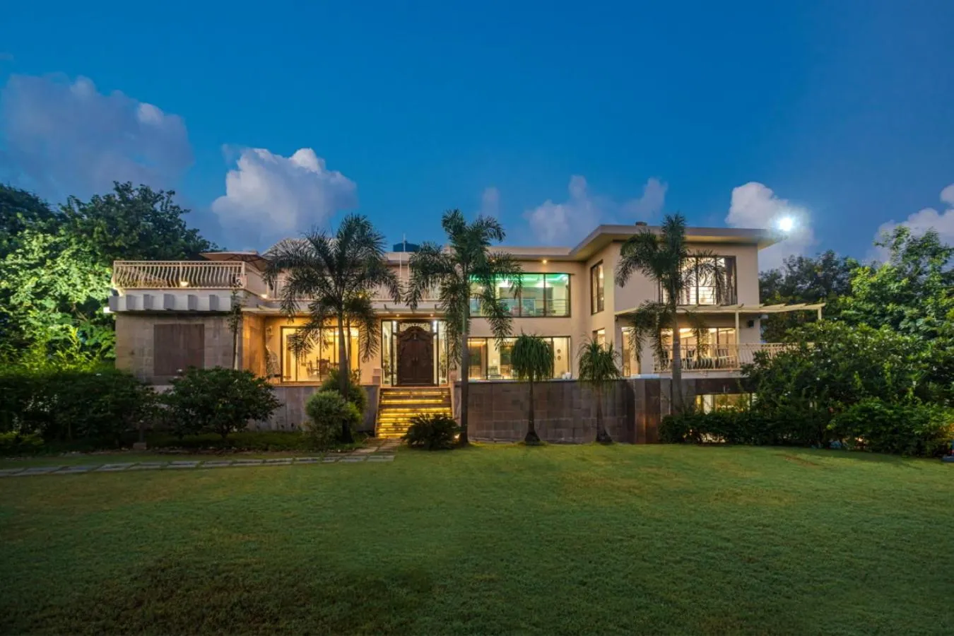 Property building in SaffronStays Aura - 4BR luxury pool villa with gym, BBQ deck, lawns & indoor games near Kihim Beach