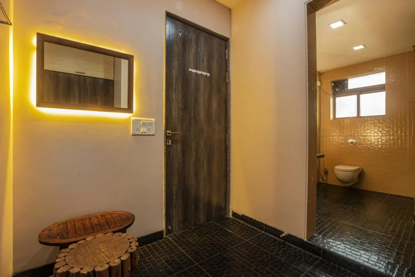 Shower in SaffronStays Aura - 4BR luxury pool villa with gym, BBQ deck, lawns & indoor games near Kihim Beach