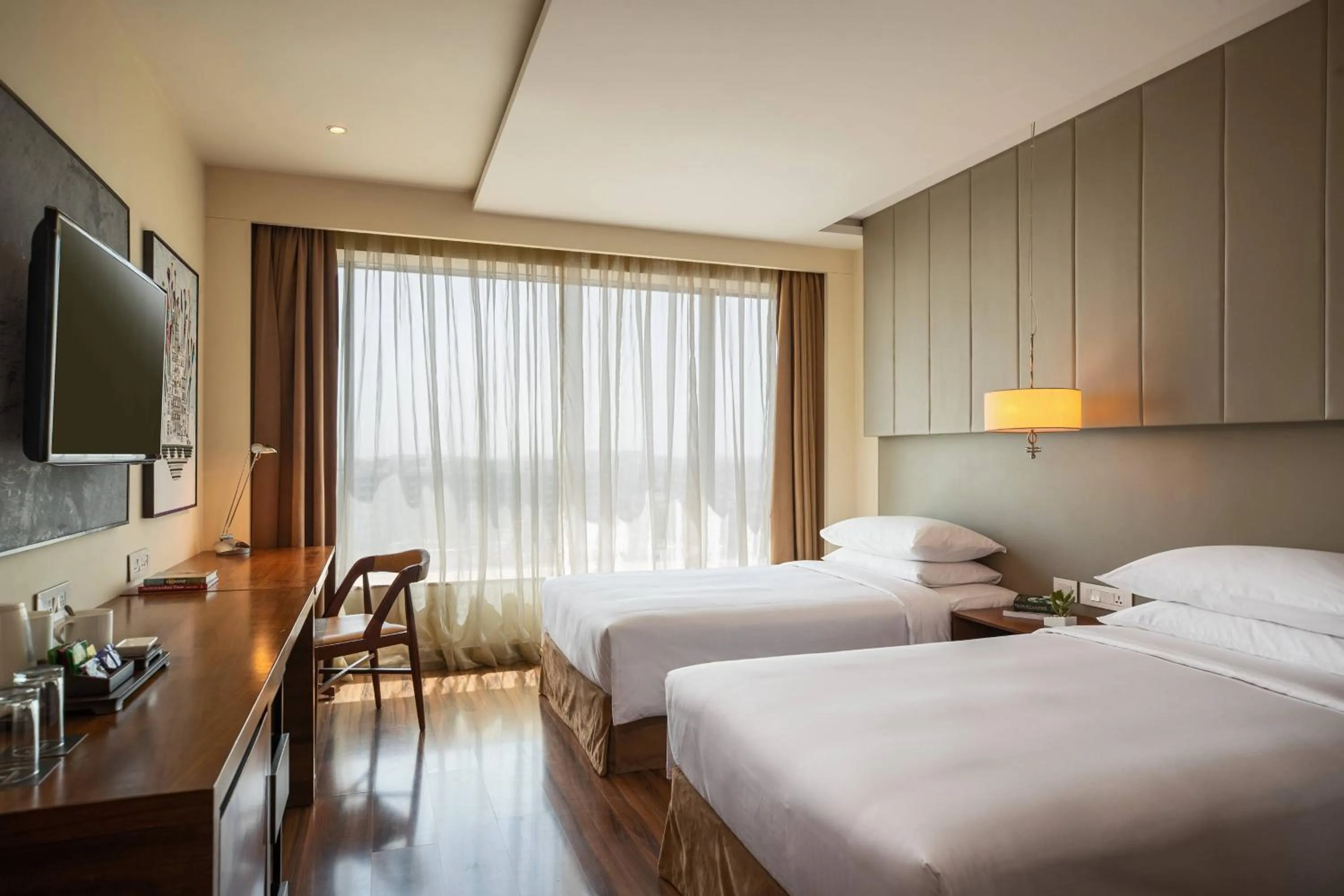 Photo of the whole room, Bed in Renaissance Ahmedabad Hotel