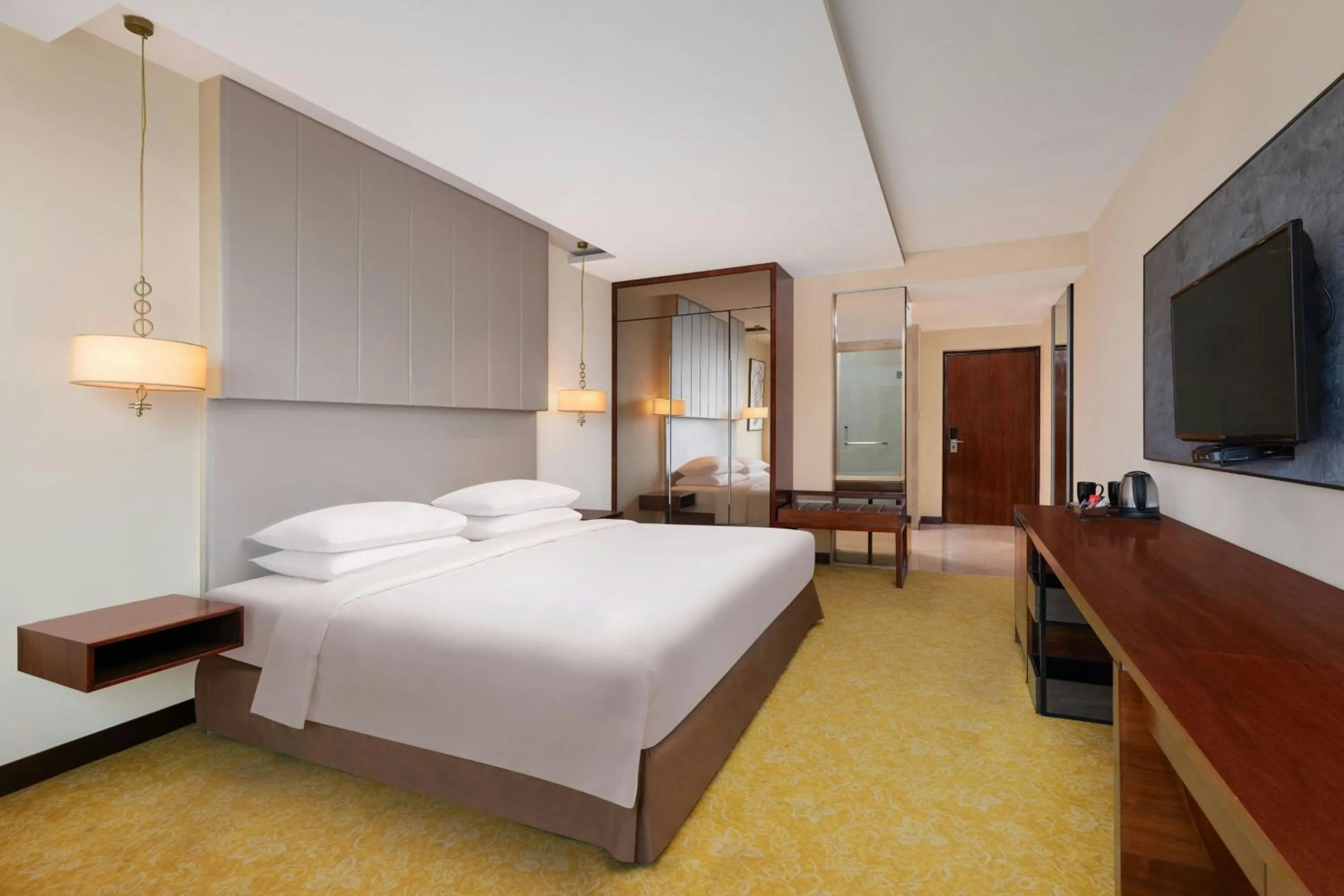 Photo of the whole room, Bed in Renaissance Ahmedabad Hotel