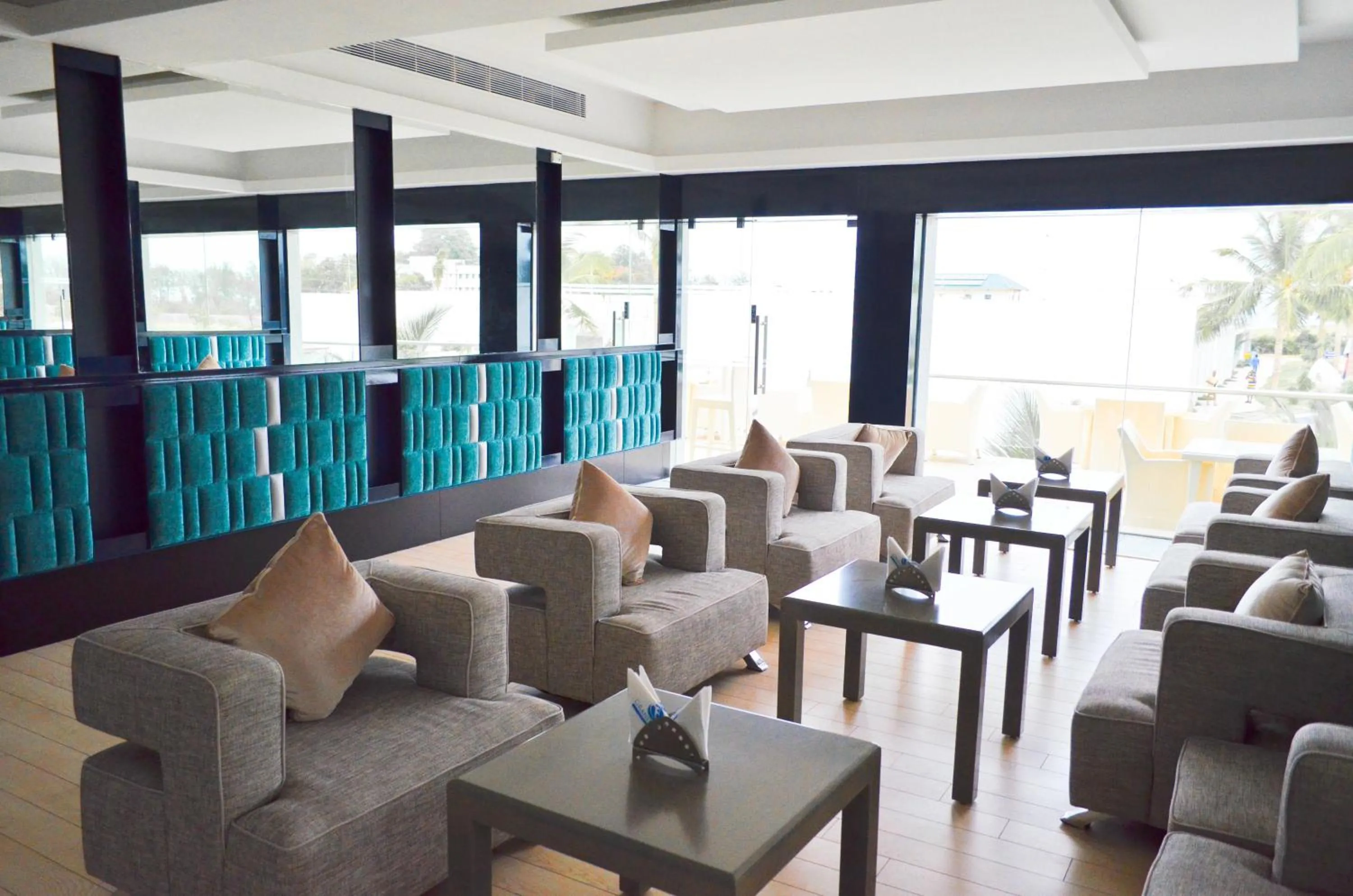 Communal lounge/ TV room in Grande Bay Resort and Spa Mamallapuram