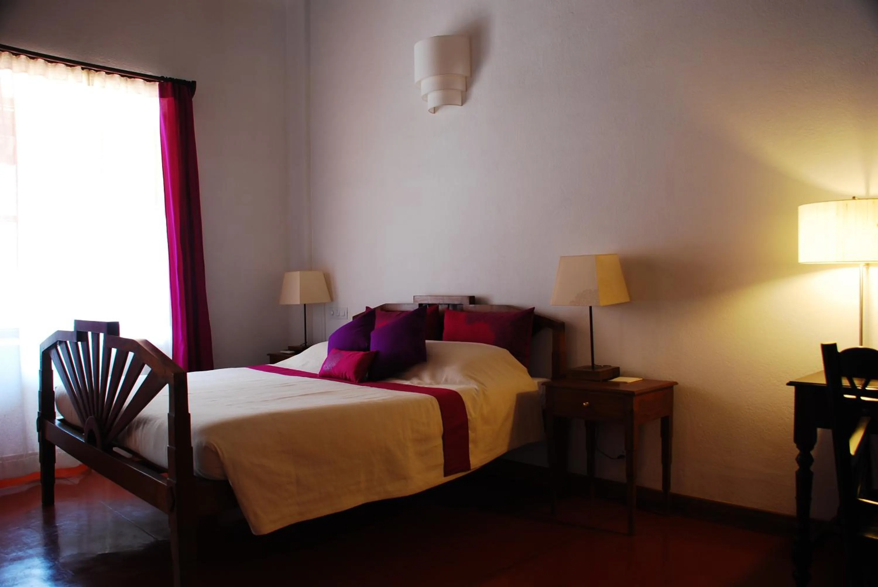 Bed in Maison Perumal Pondicherry - A CGH Earth Experience