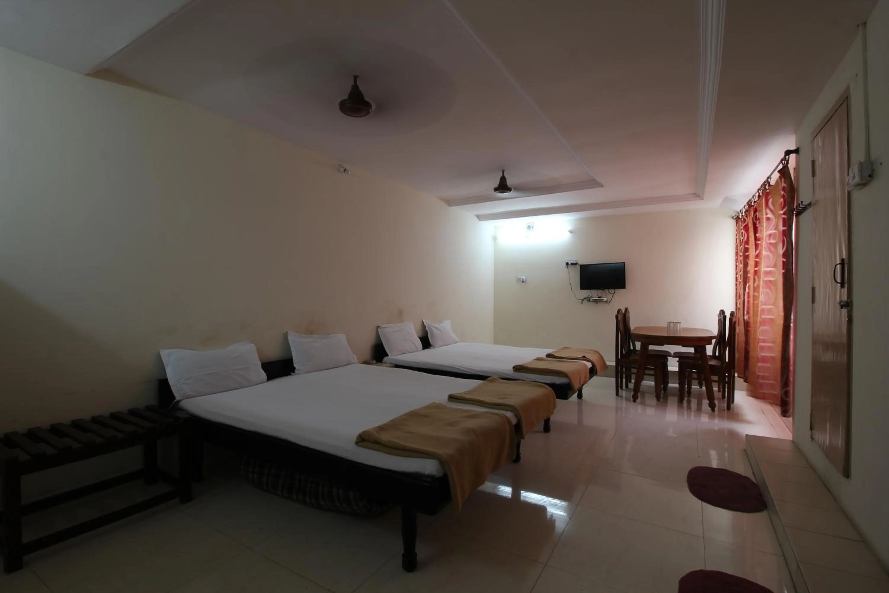 Bed in Hotel Maya Deluxe