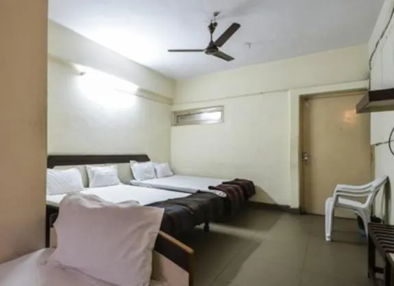 Bed in Hotel Maya Deluxe