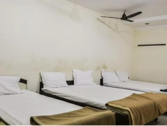 Bed in Hotel Maya Deluxe