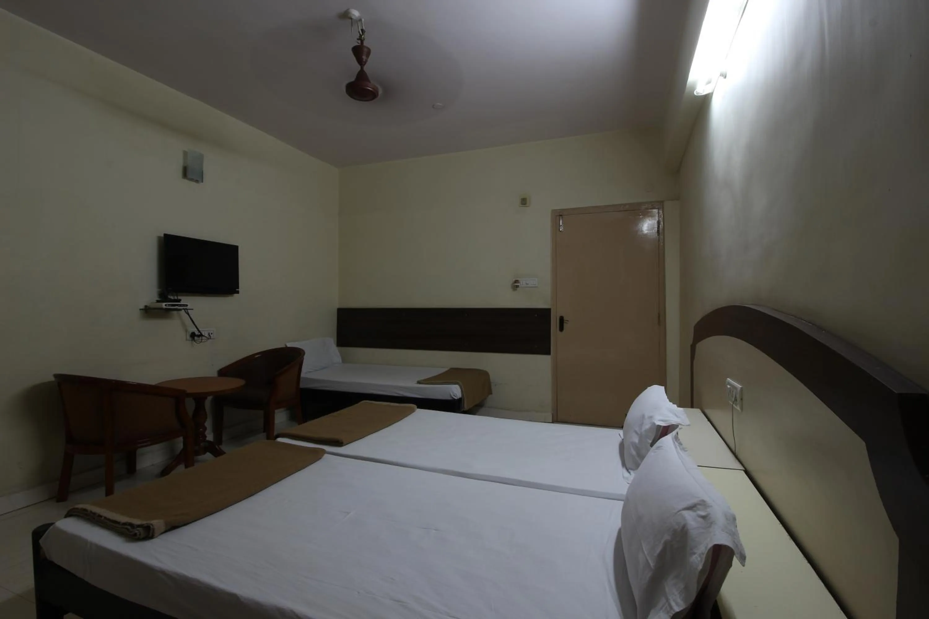 Bed in Hotel Maya Deluxe