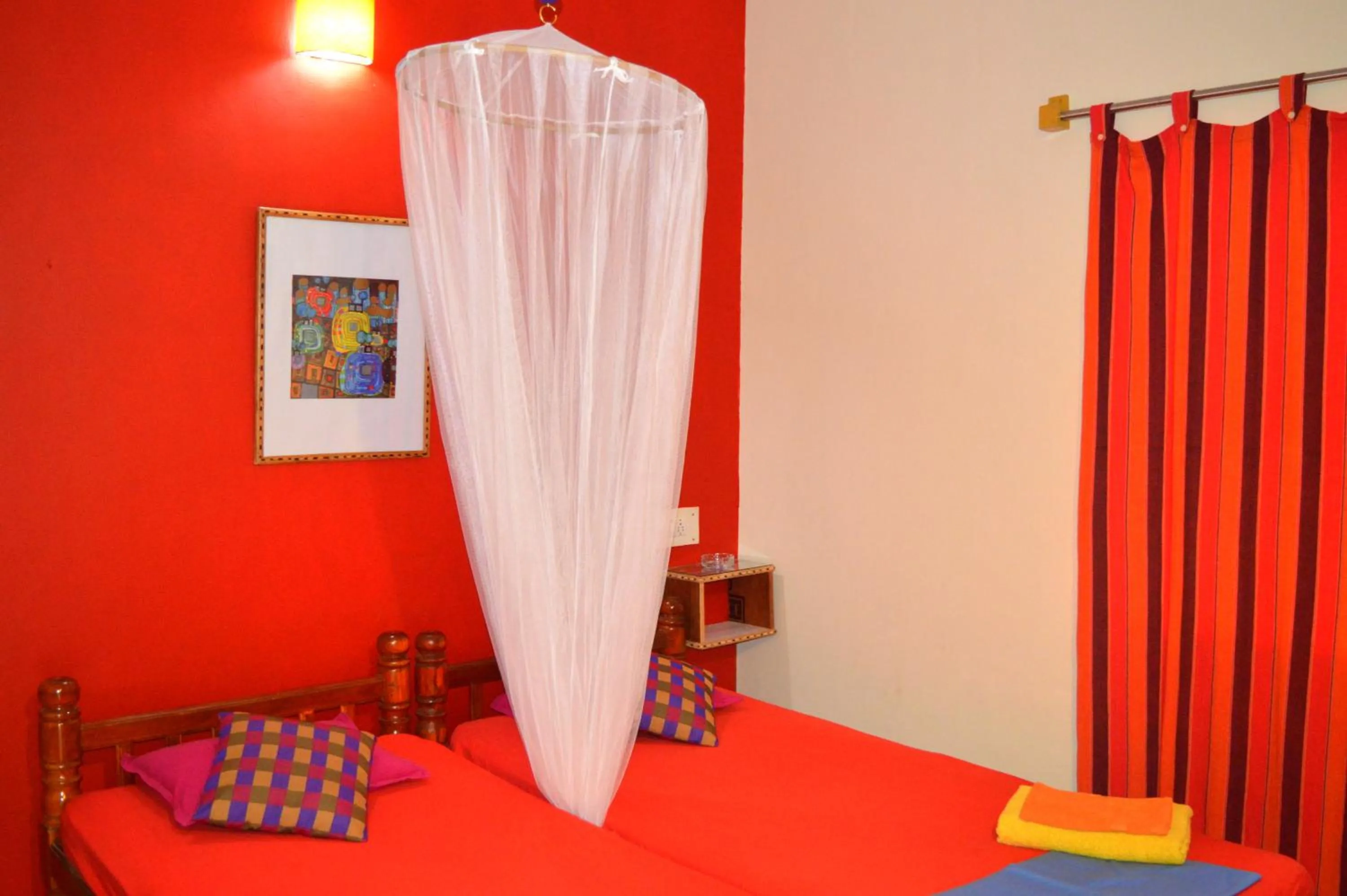 Photo of the whole room, Bed in Namaste Yoga Farm