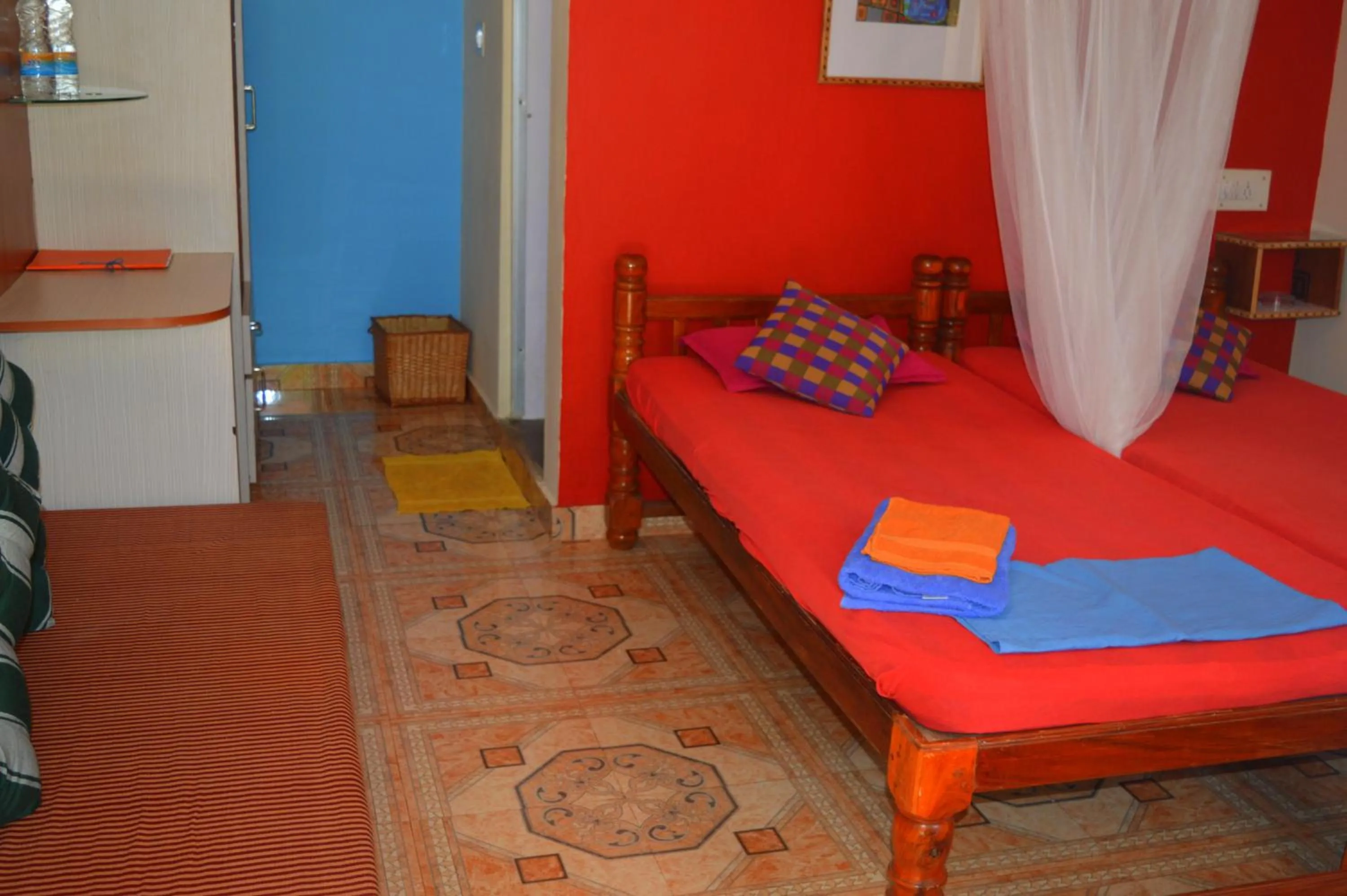 Photo of the whole room, Bed in Namaste Yoga Farm