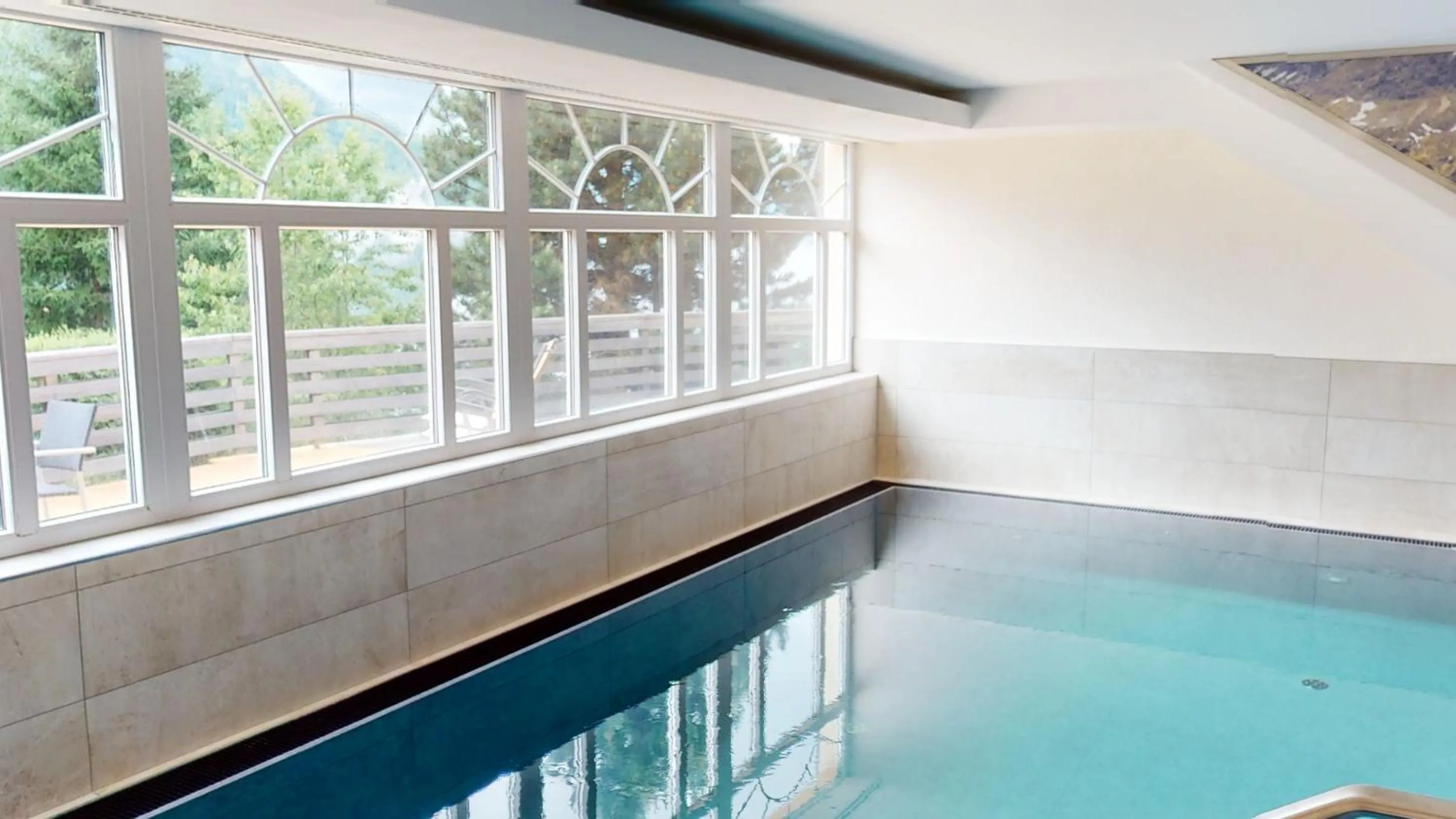 Swimming pool in Wellness Aparthotel Panorama Alpin - Ferienwohnungen Jerzens im Pitztal
