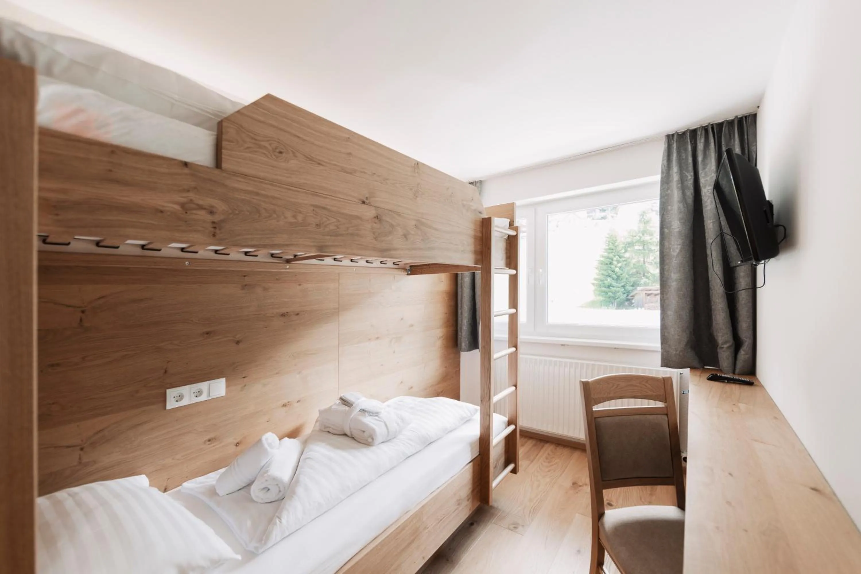 Photo of the whole room, Bed in Wellness Aparthotel Panorama Alpin - Ferienwohnungen Jerzens im Pitztal
