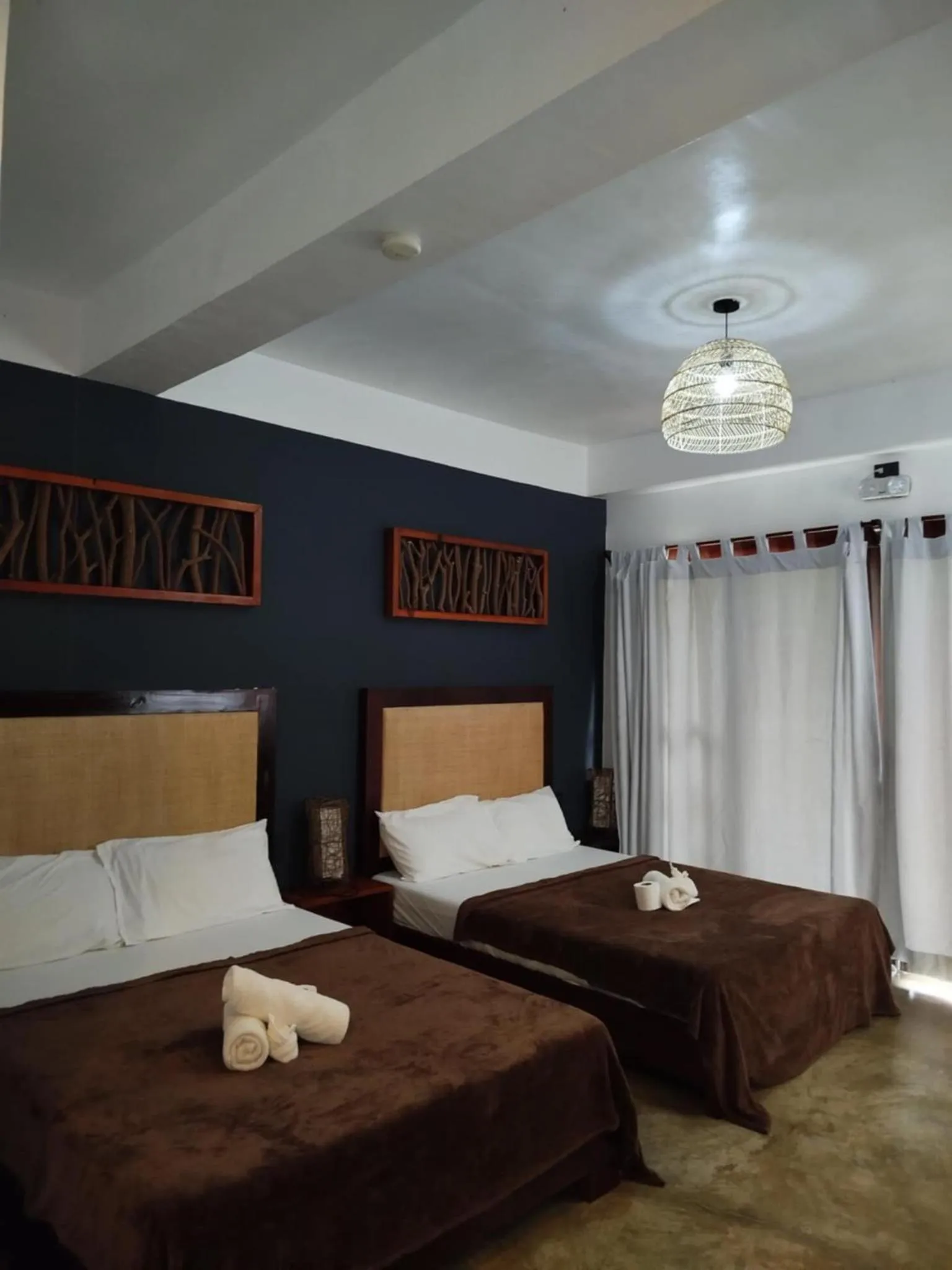 Photo of the whole room, Bed in Lagkaw Siargao Villas