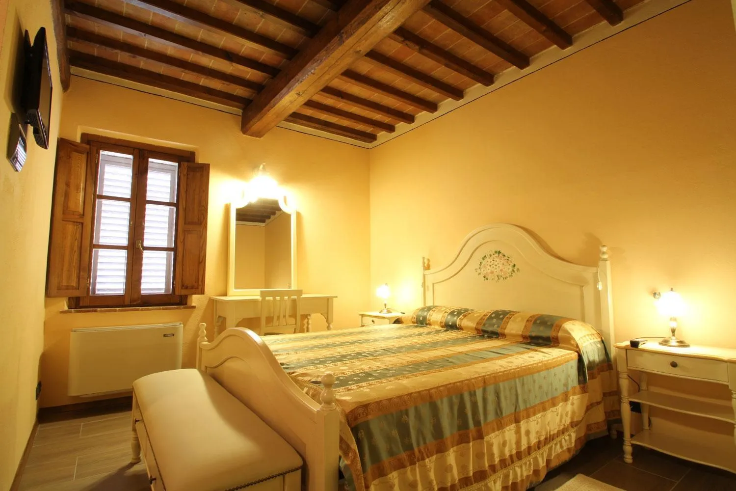 Bed in Relais La Leopolda