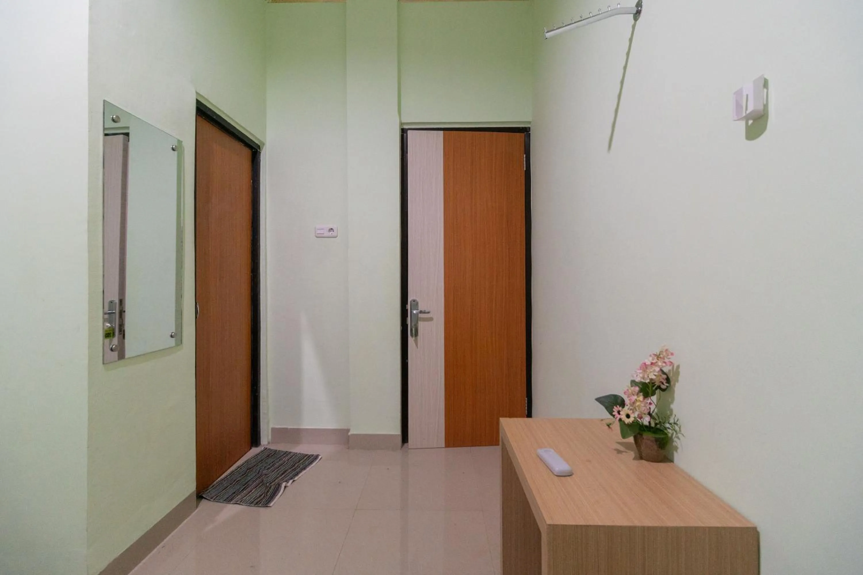Bedroom in Urbanview Hotel Lumendiva 2 Palembang by RedDoorz