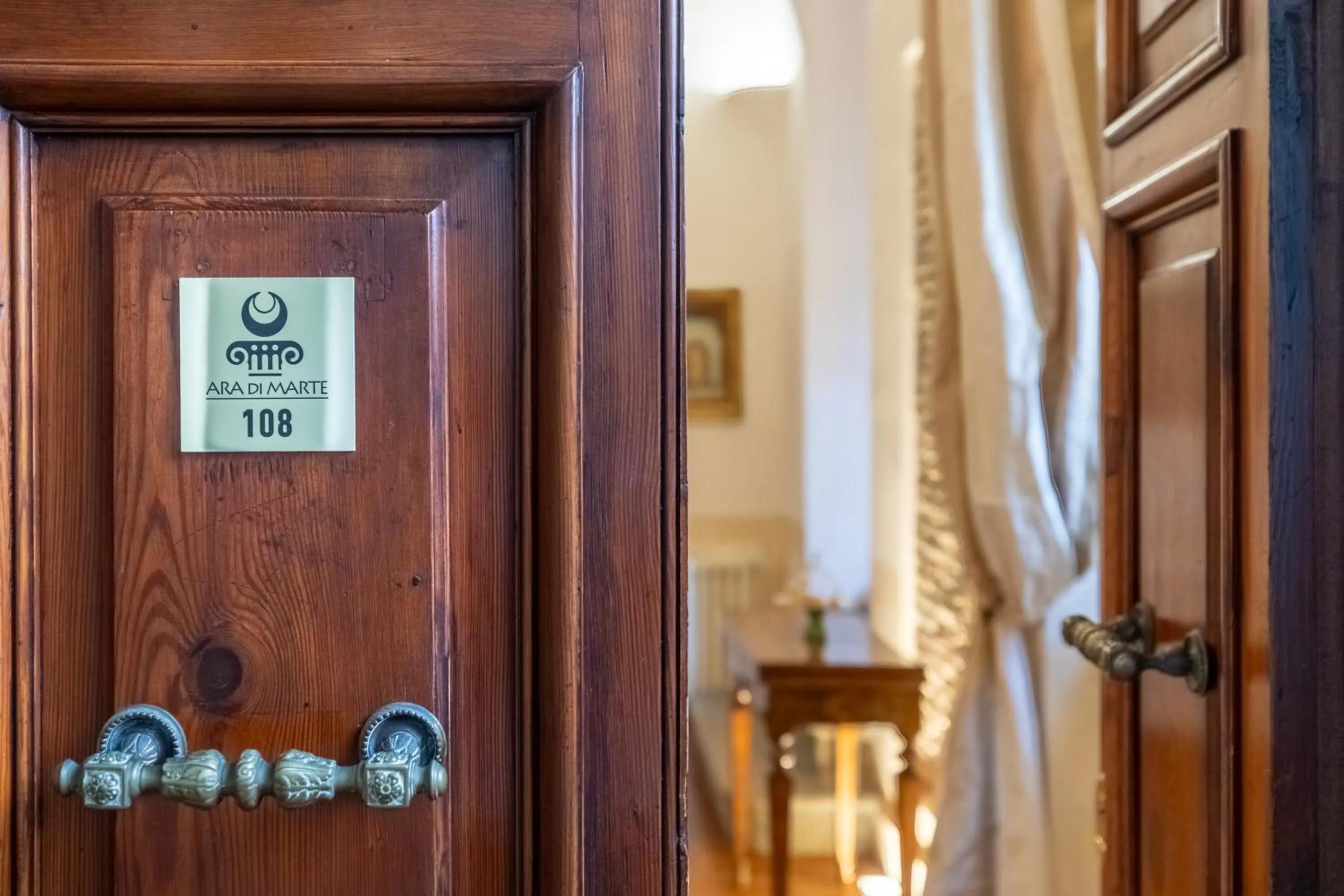 Logo/Certificate/Sign in Ara di Marte Suites