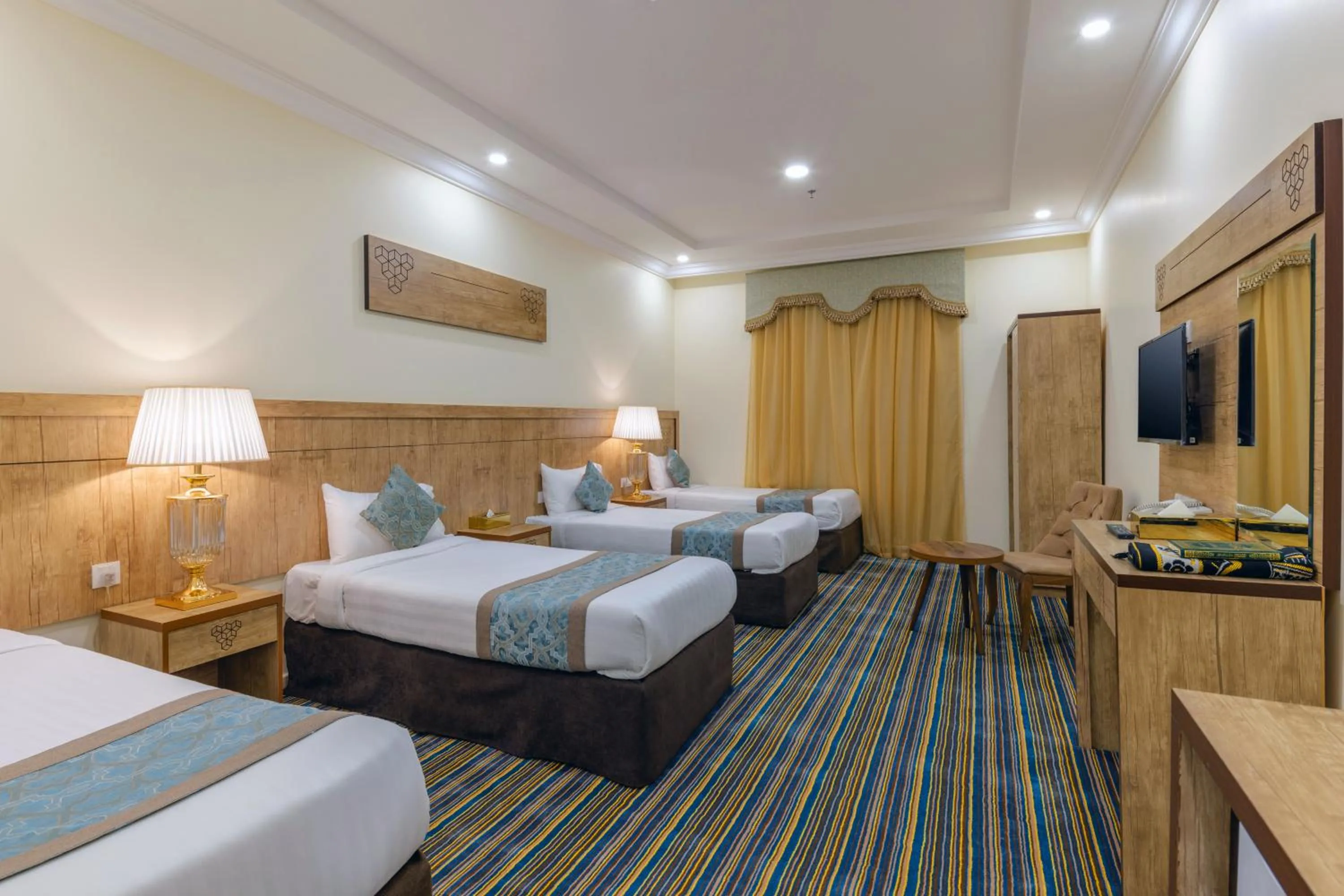 Bed in فندق سنود الدانة Snood Al Dana Hotel