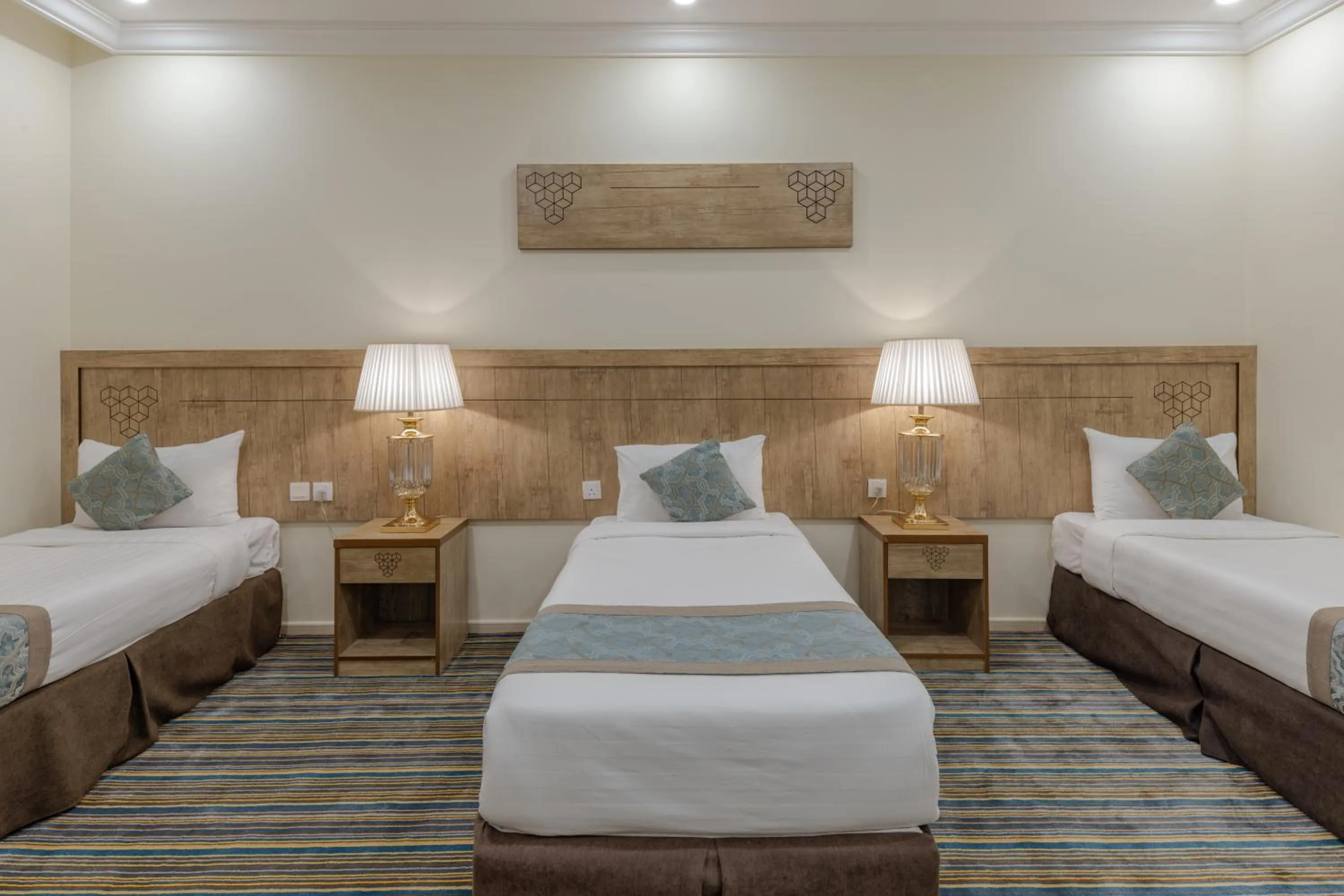 Bed in فندق سنود الدانة Snood Al Dana Hotel