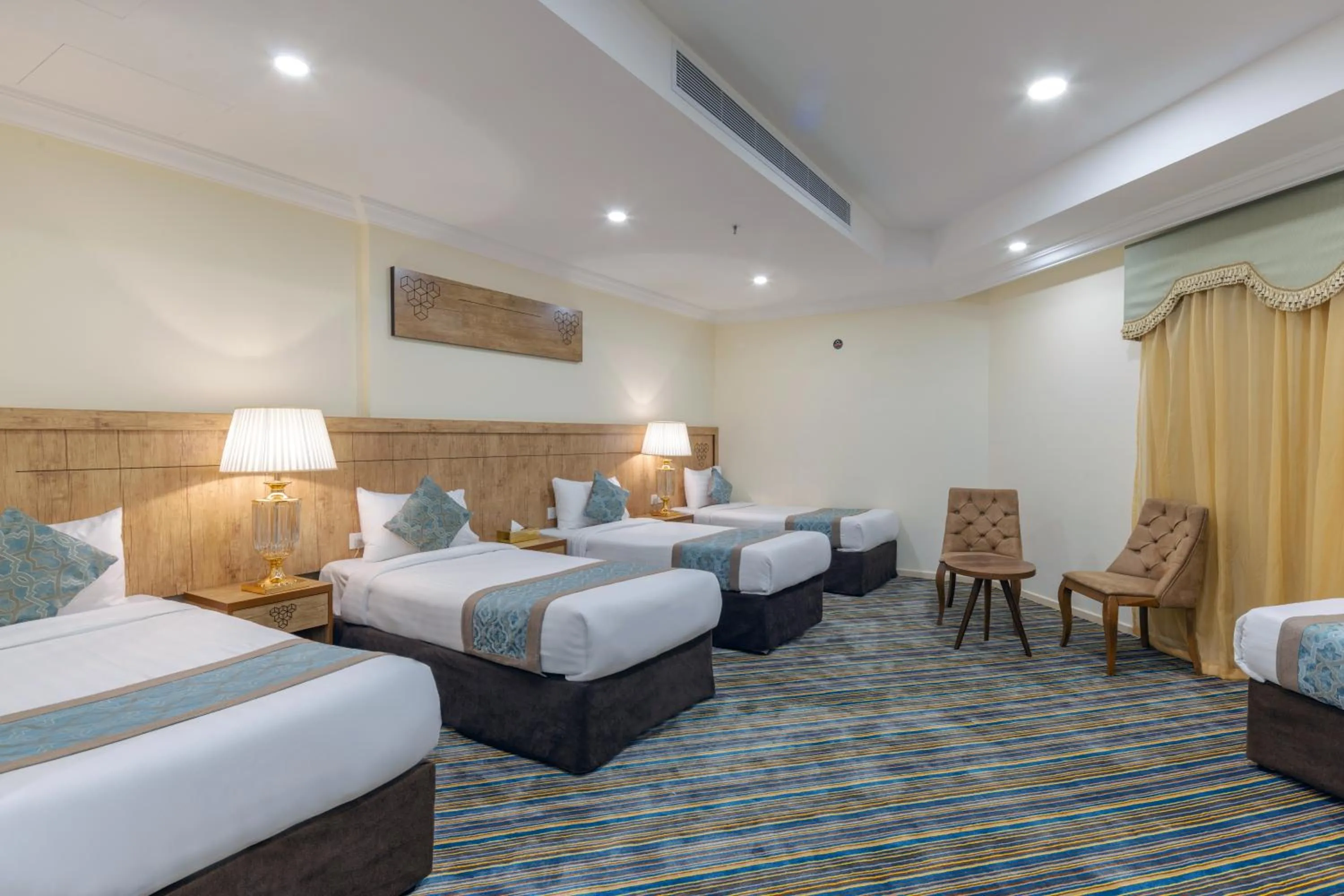 Bed in فندق سنود الدانة Snood Al Dana Hotel