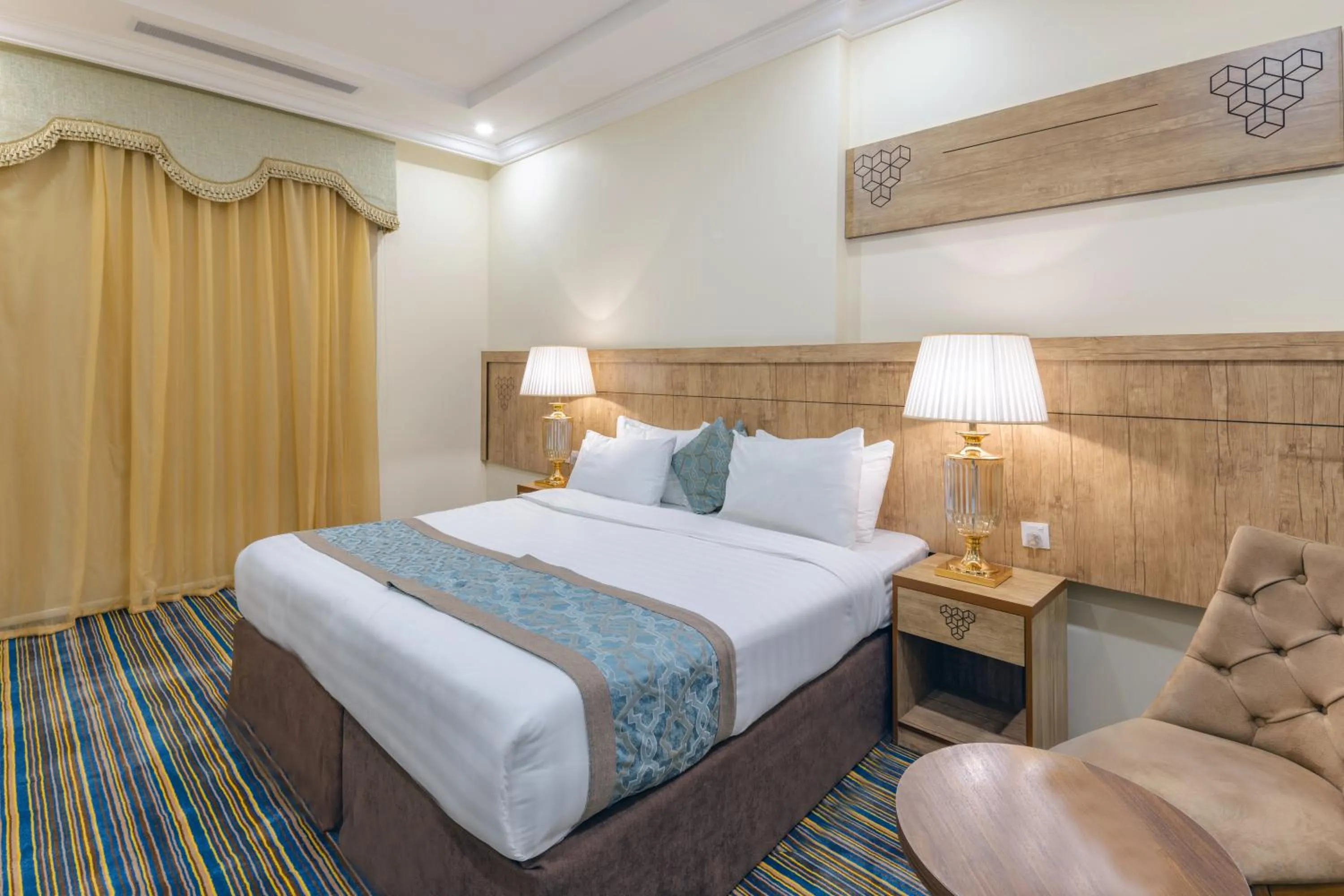 Bed in فندق سنود الدانة Snood Al Dana Hotel