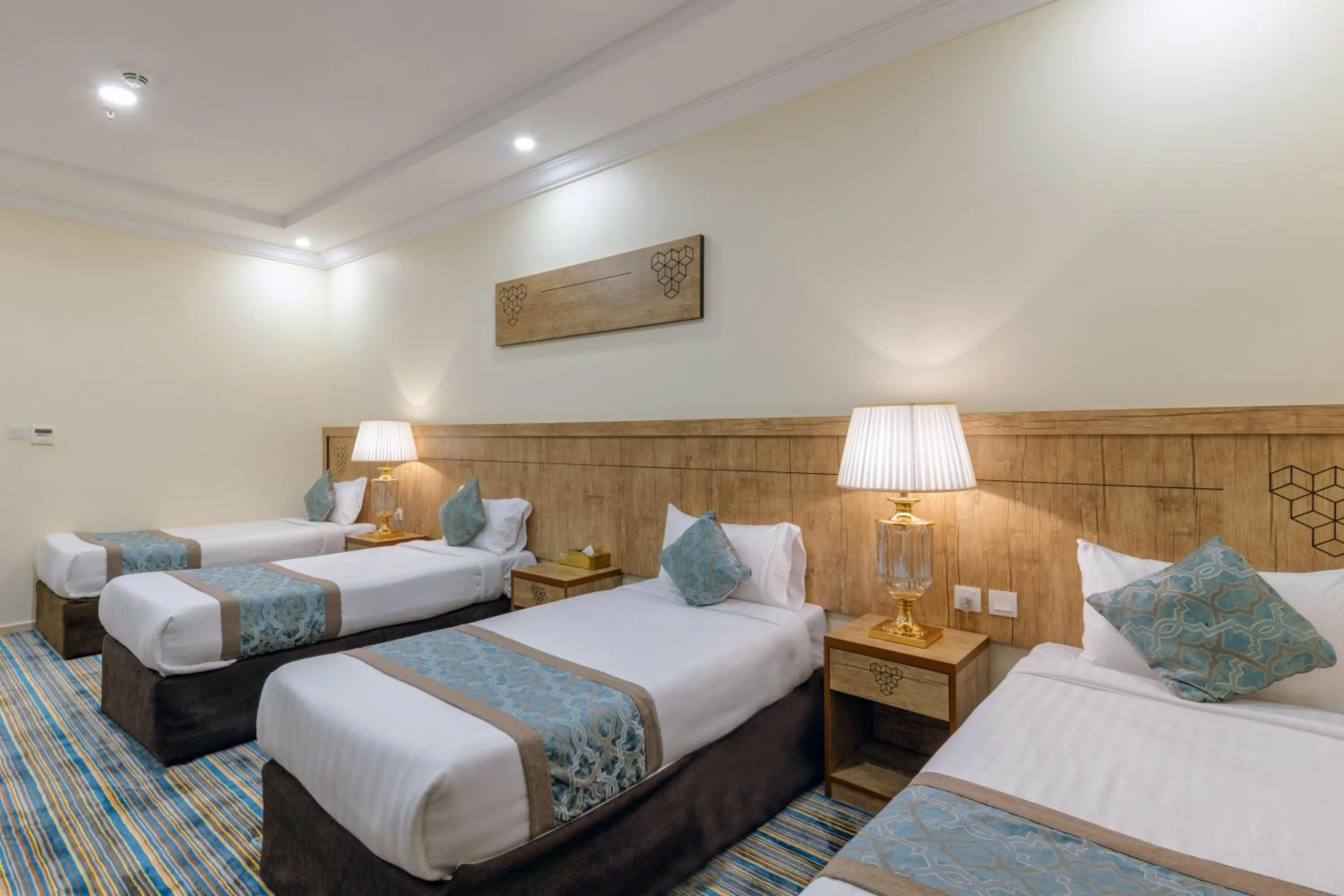 Bed in فندق سنود الدانة Snood Al Dana Hotel