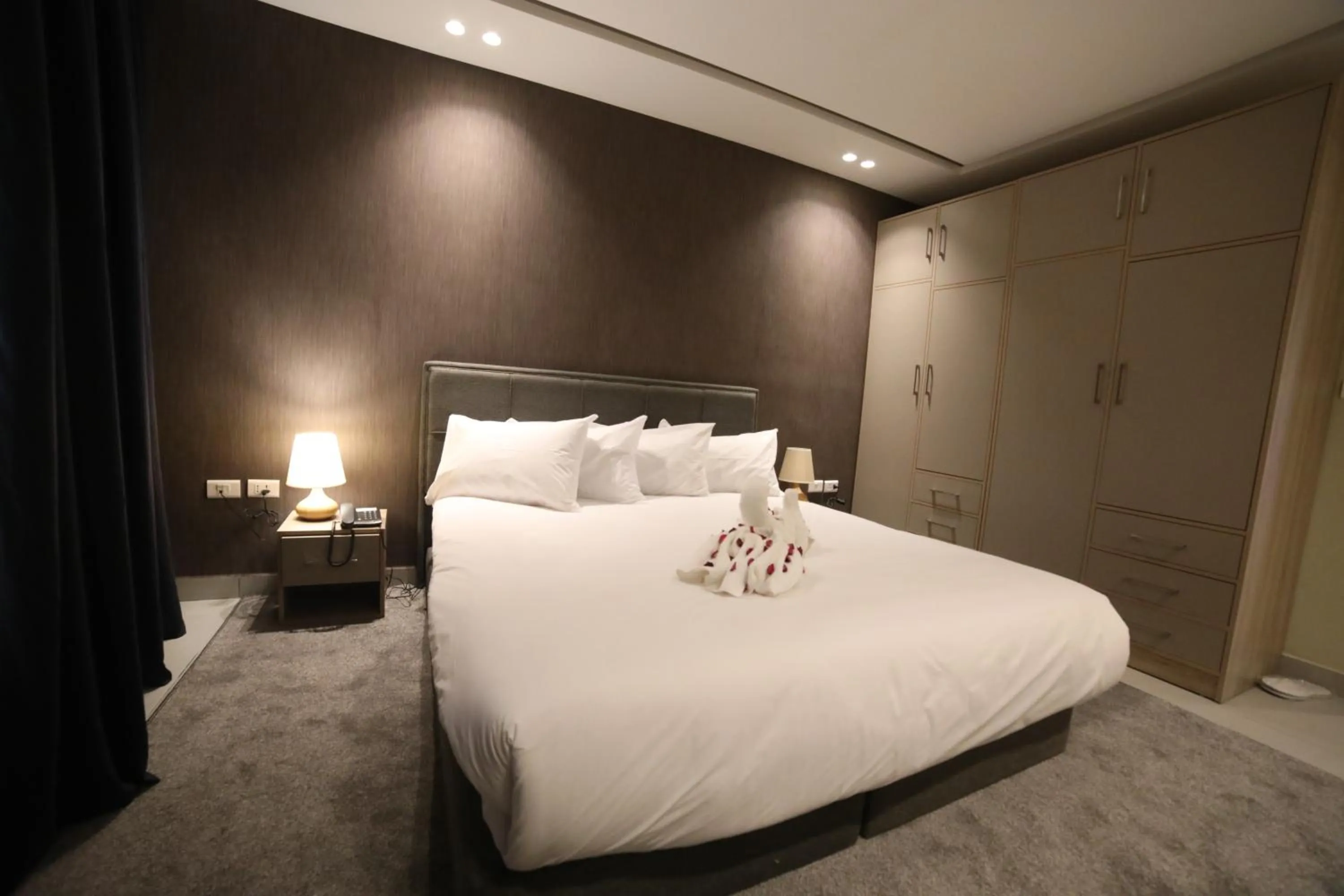 Bed in فندق صحارى الخليج Sahara Gulf Hotel Apartments